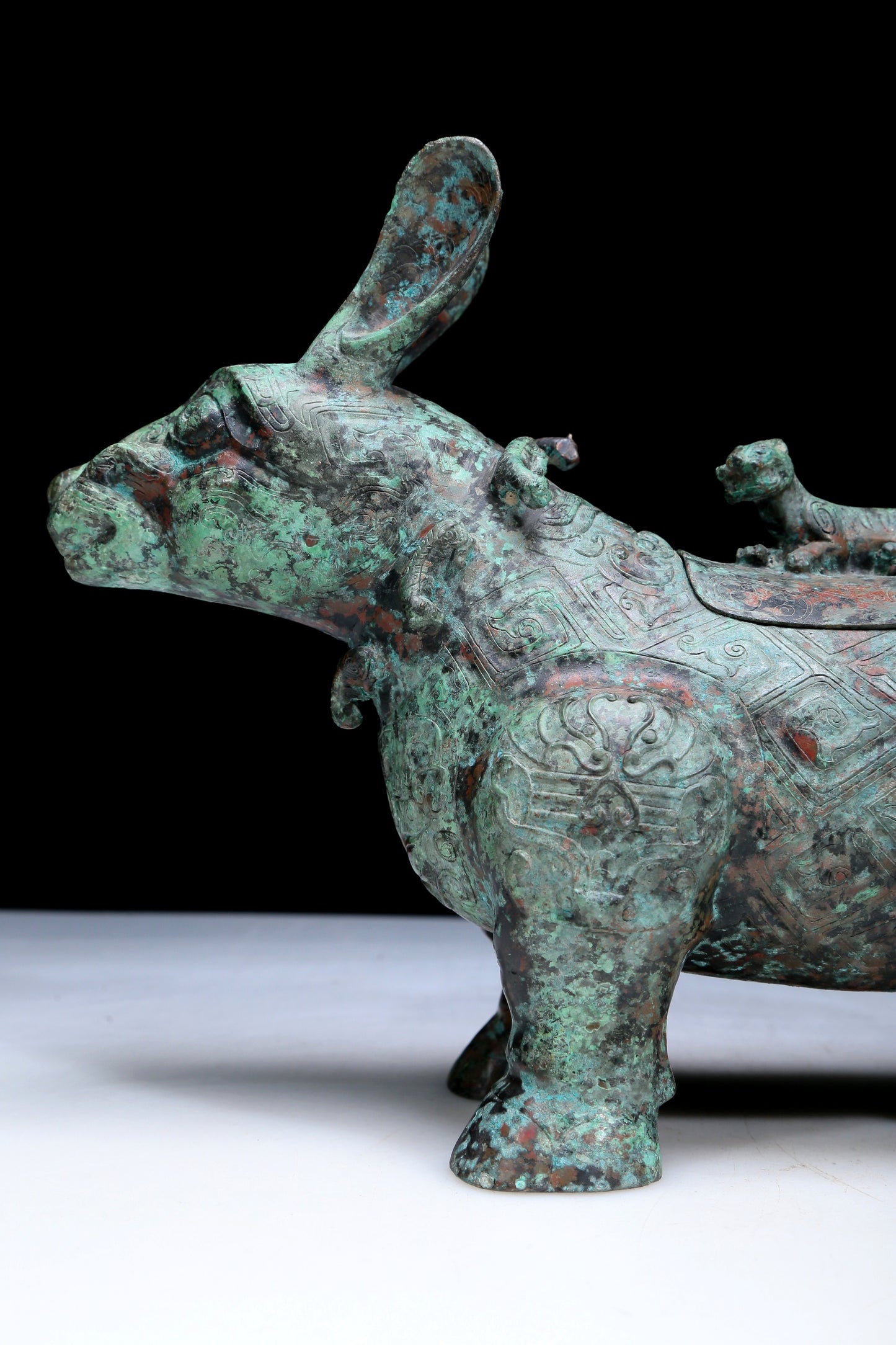 An Archaic Bronze Auspicious Beast-Form Jar With Inscriptions