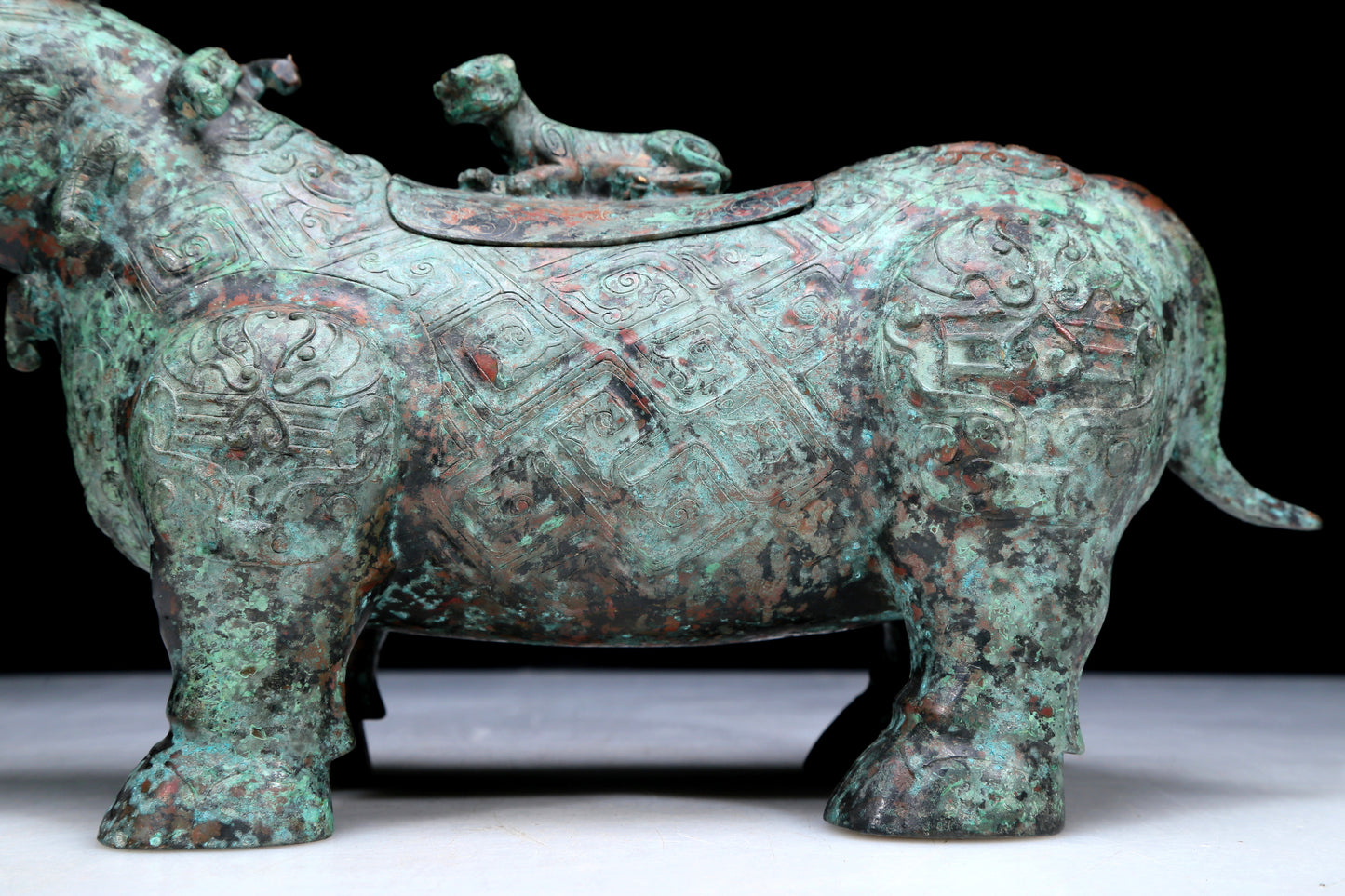 An Archaic Bronze Auspicious Beast-Form Jar With Inscriptions