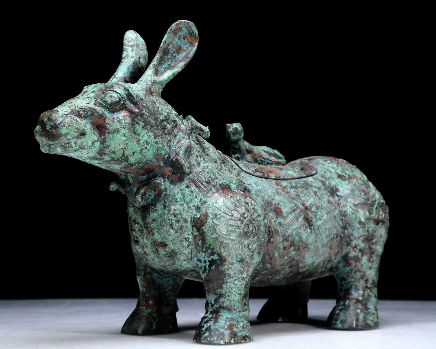 An Archaic Bronze Auspicious Beast-Form Jar With Inscriptions