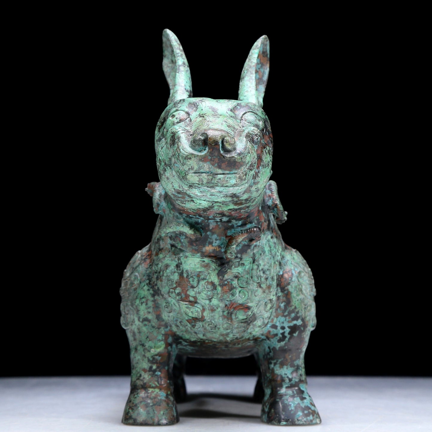 An Archaic Bronze Auspicious Beast-Form Jar With Inscriptions