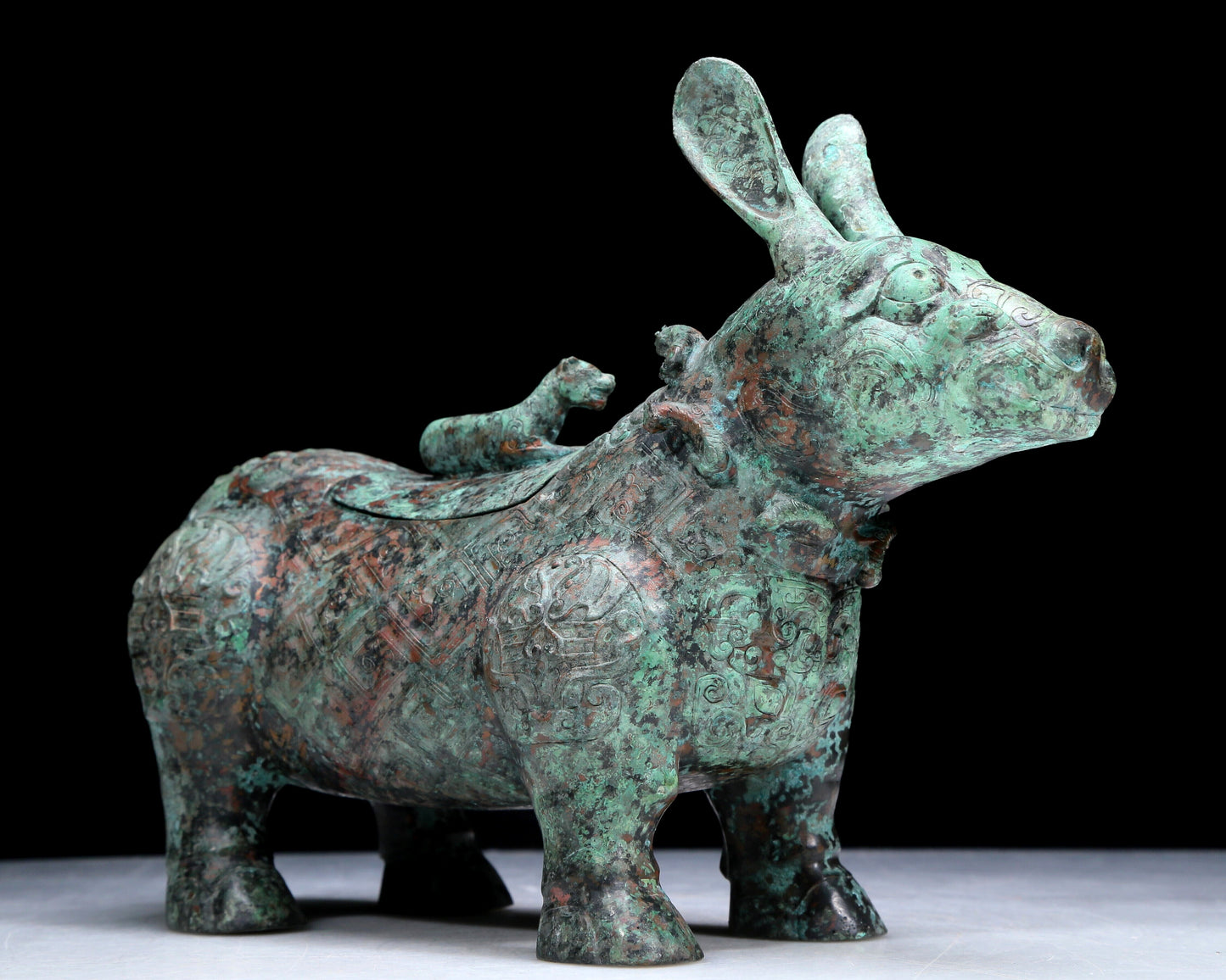 An Archaic Bronze Auspicious Beast-Form Jar With Inscriptions