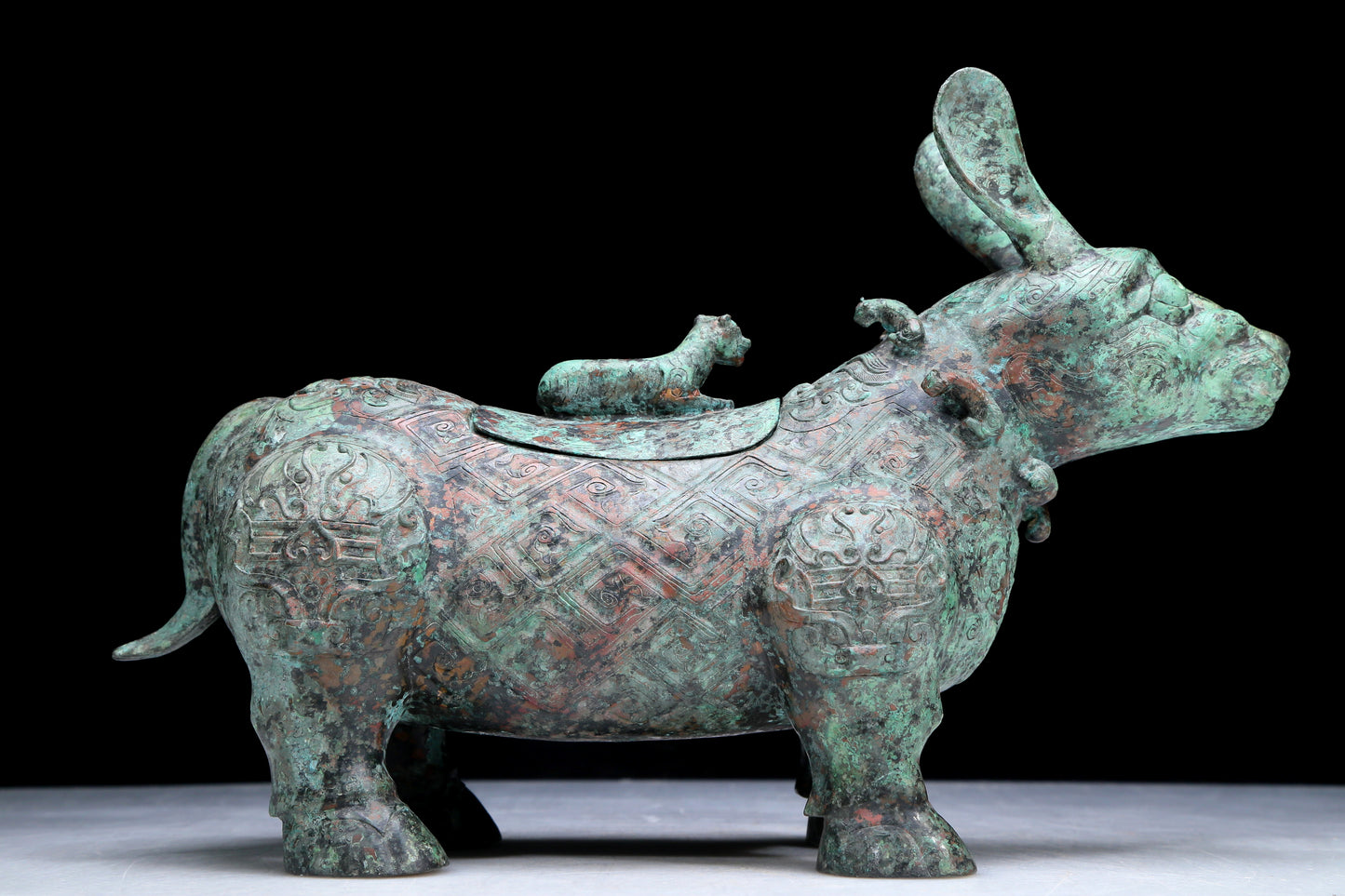 An Archaic Bronze Auspicious Beast-Form Jar With Inscriptions