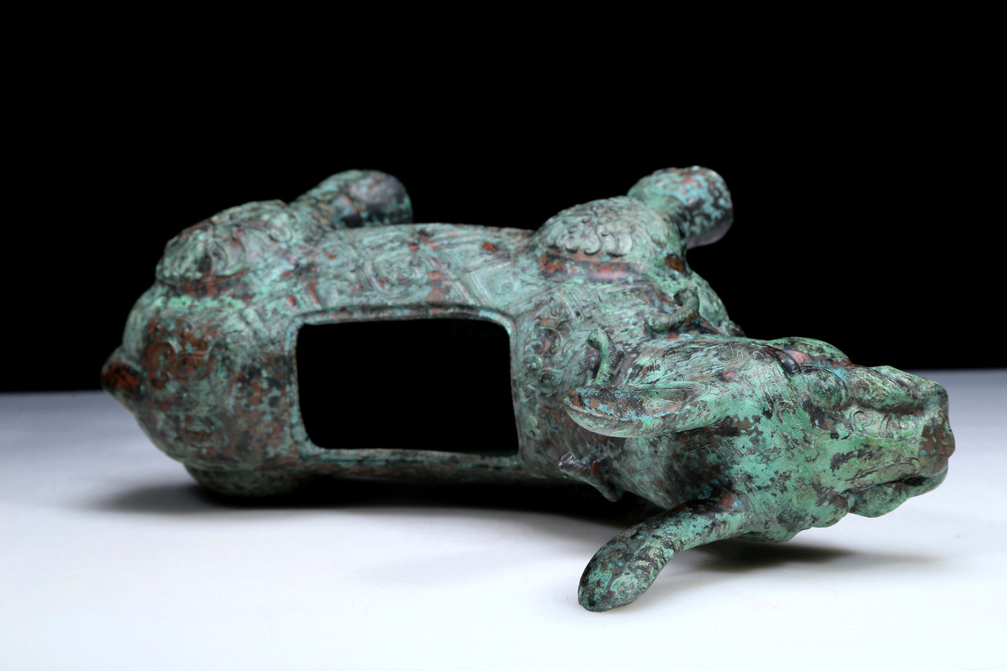 An Archaic Bronze Auspicious Beast-Form Jar With Inscriptions