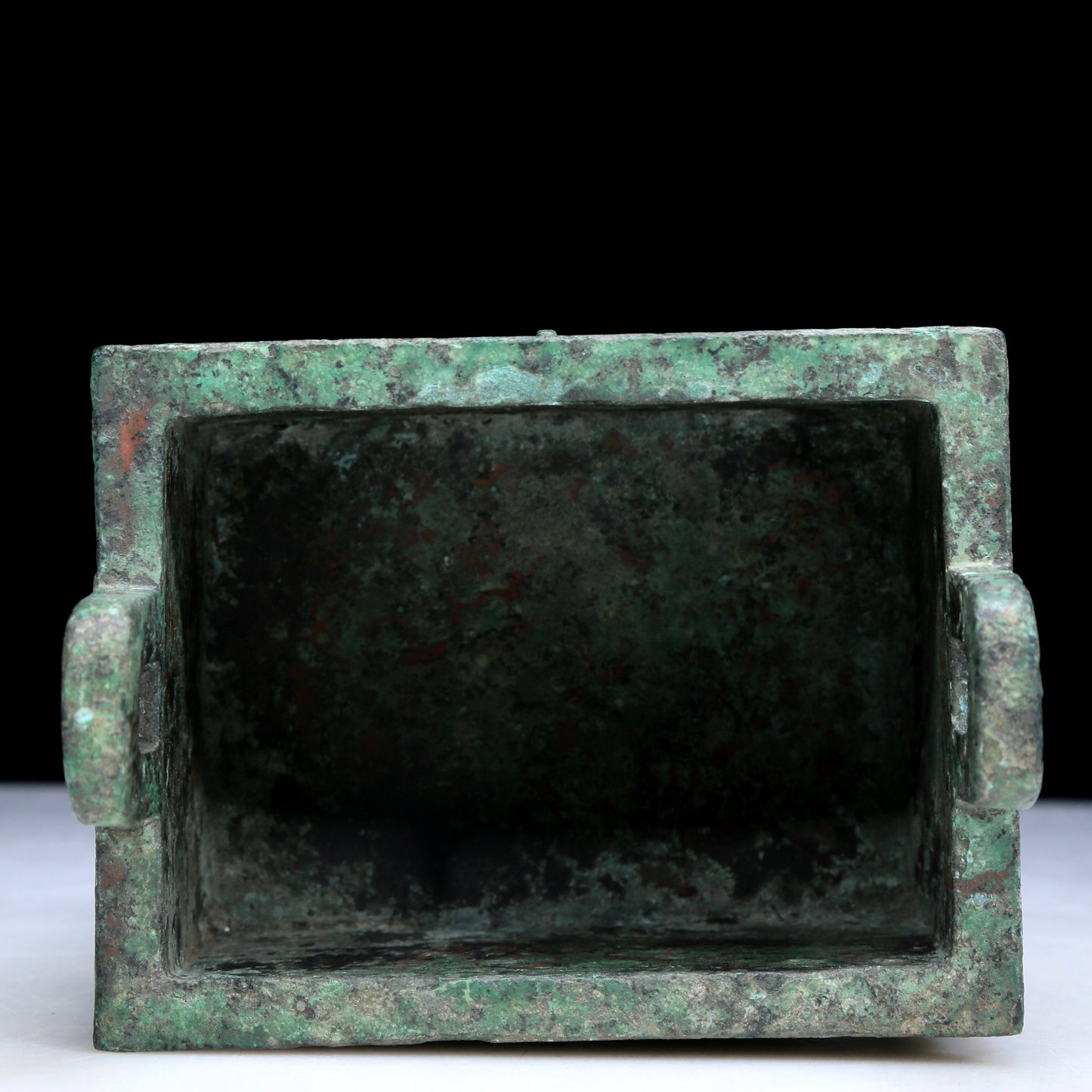 An Archaic Bronze 'Animal Mask' Ritual Food Vessel, Ding
