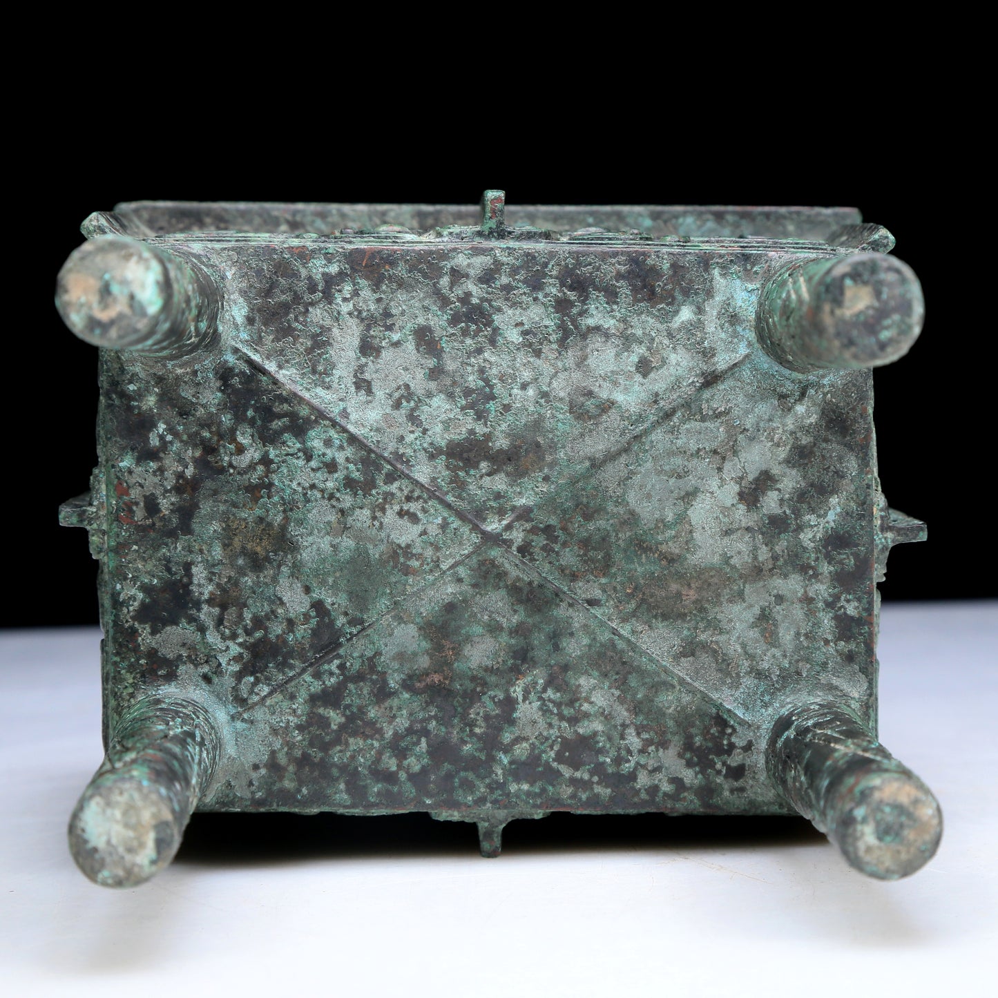 An Archaic Bronze 'Animal Mask' Ritual Food Vessel, Ding