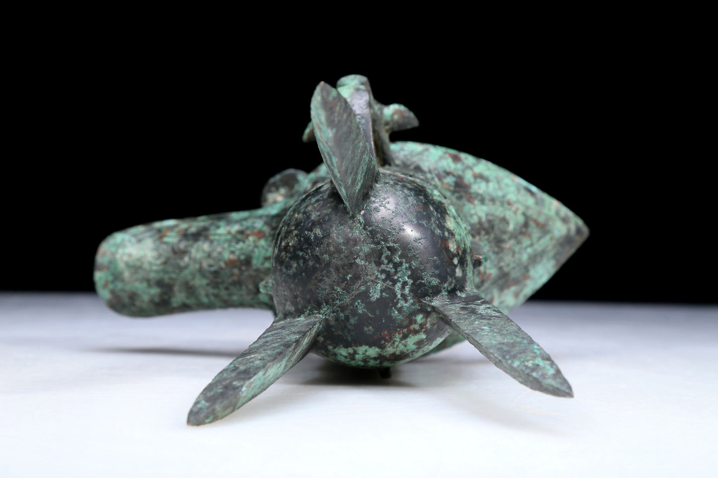 An Archaic Bronze 'Animal Mask' Tripod Cup