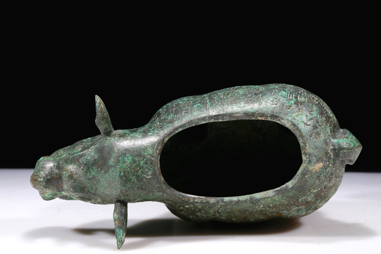 A Fantastic Bronze Rhinoceros-Form Jar With Inscriptions