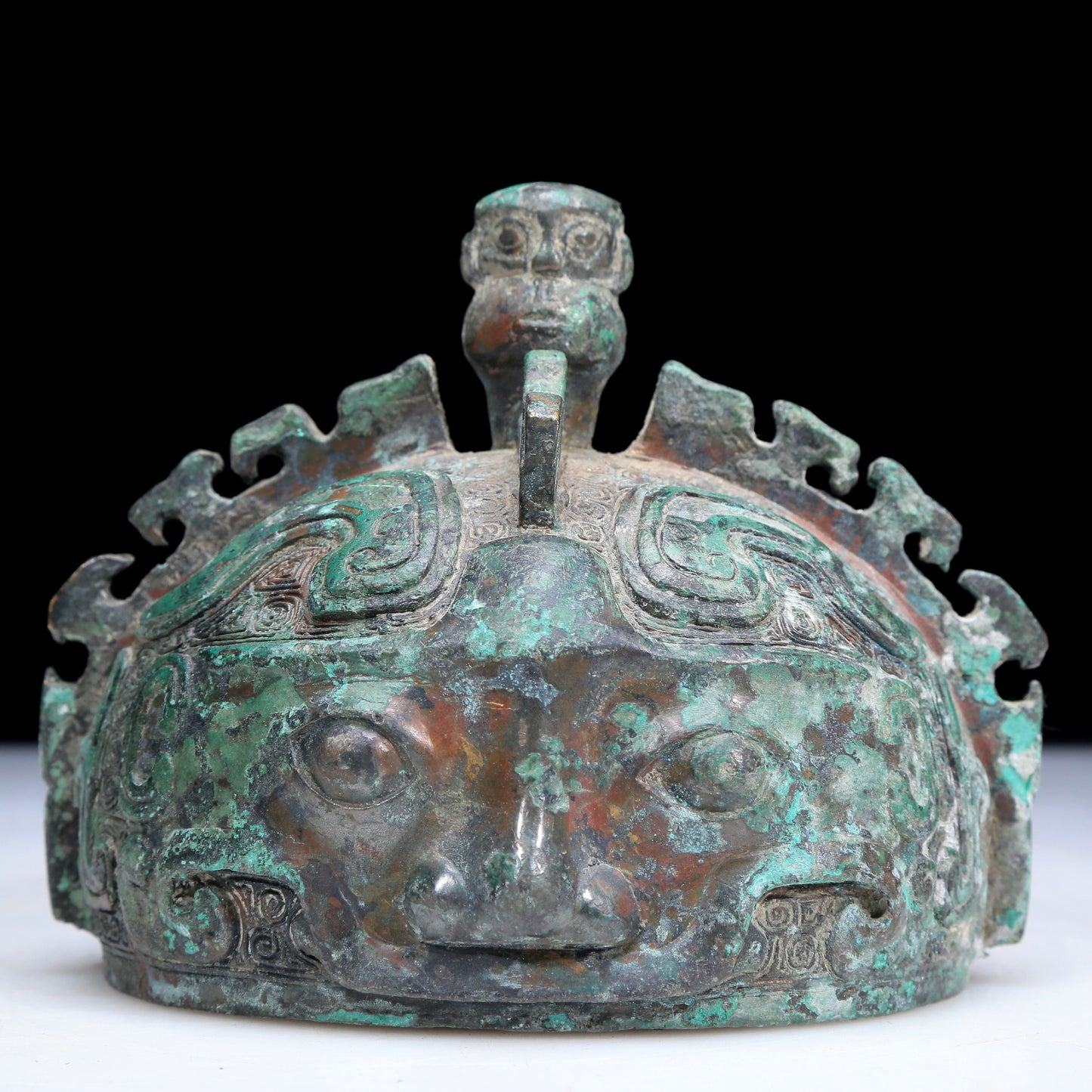 An Archaic Bronze 'Animal Mask' Pot With Inscriptions And An Overhead Handle