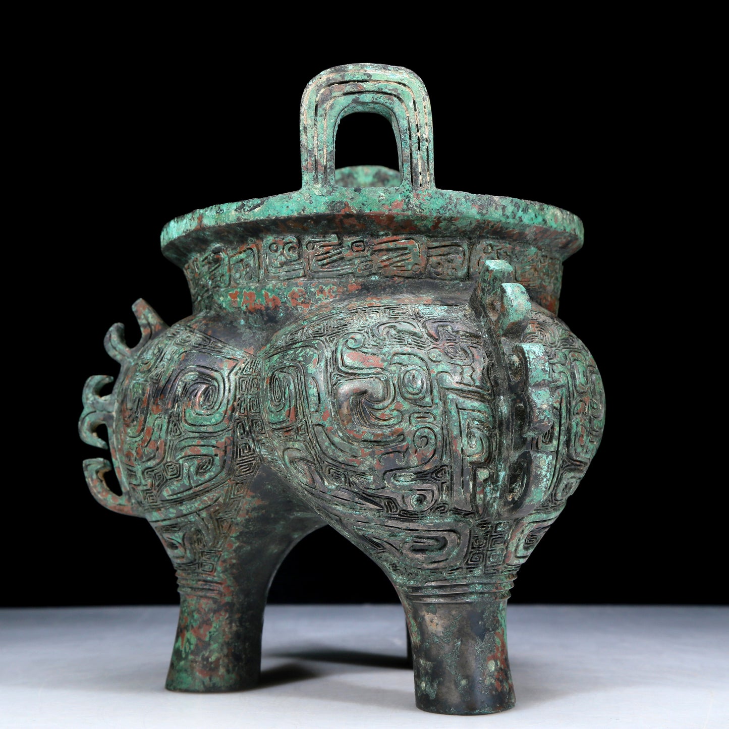 An Archaic Bronze 'Animal Mask' Tripod Censer With Inscriptions