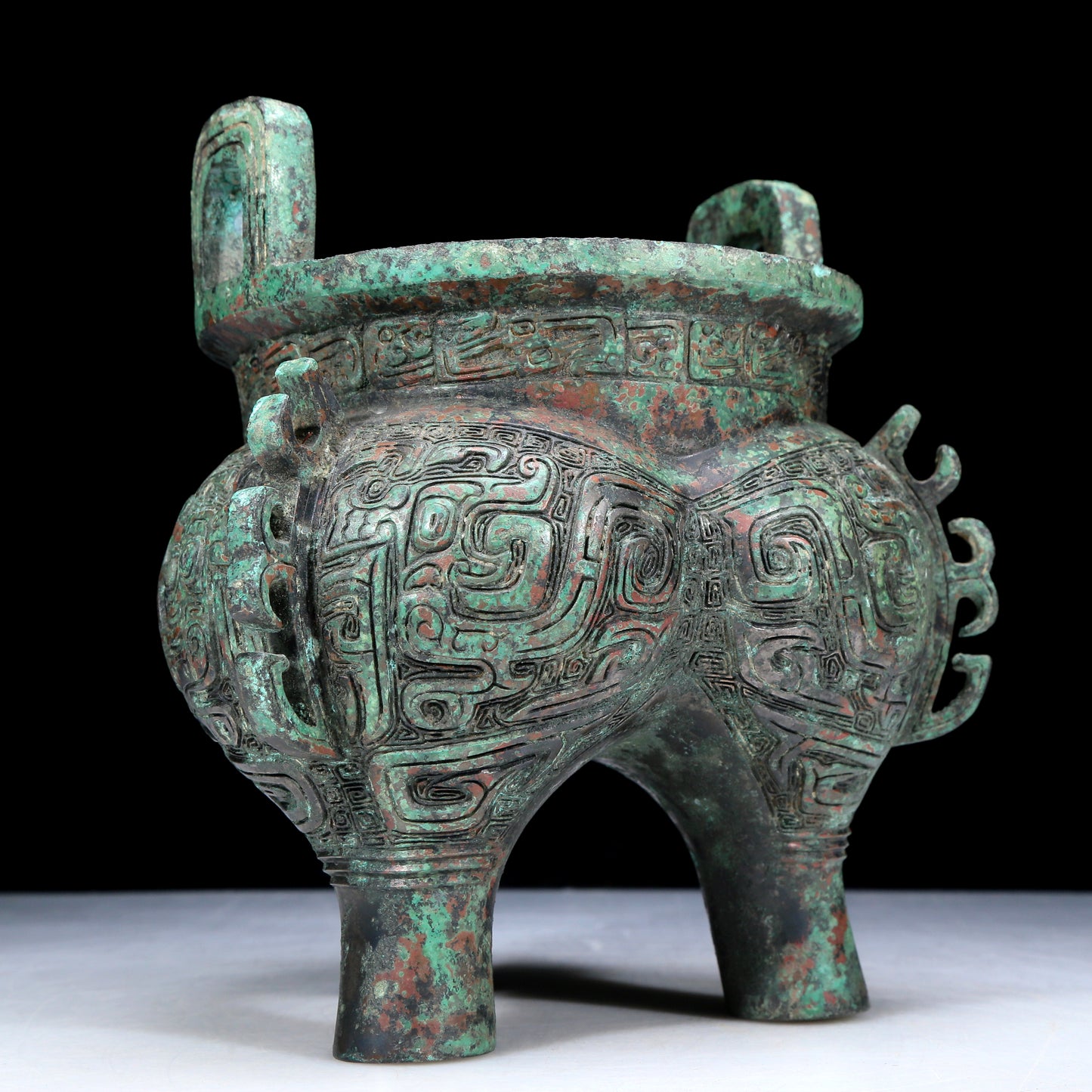 An Archaic Bronze 'Animal Mask' Tripod Censer With Inscriptions