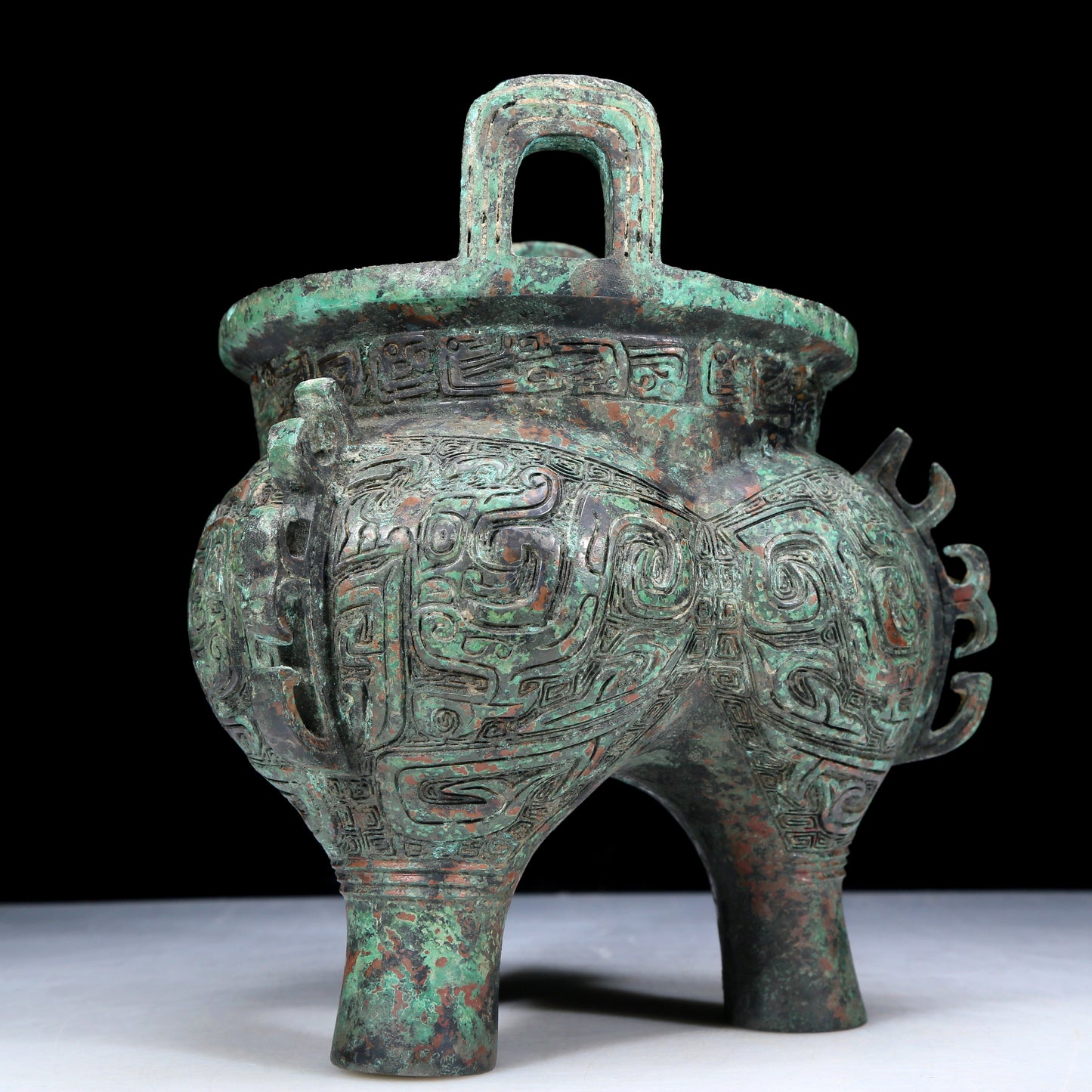 An Archaic Bronze 'Animal Mask' Tripod Censer With Inscriptions