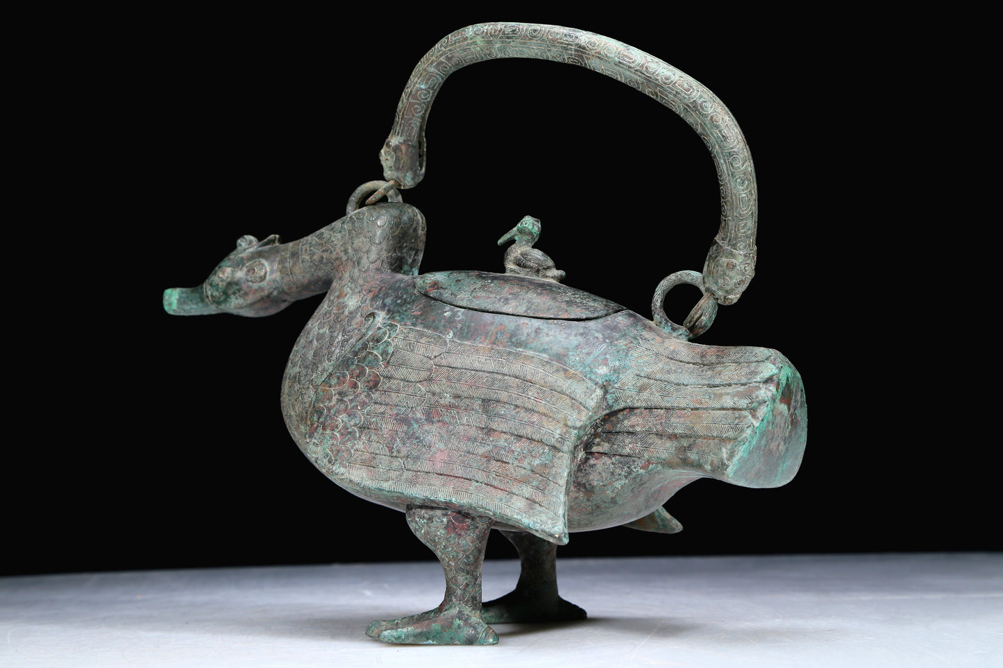 An Archaic Bronze Duck-Form Pot With Inscriptions And An Overhead Handle