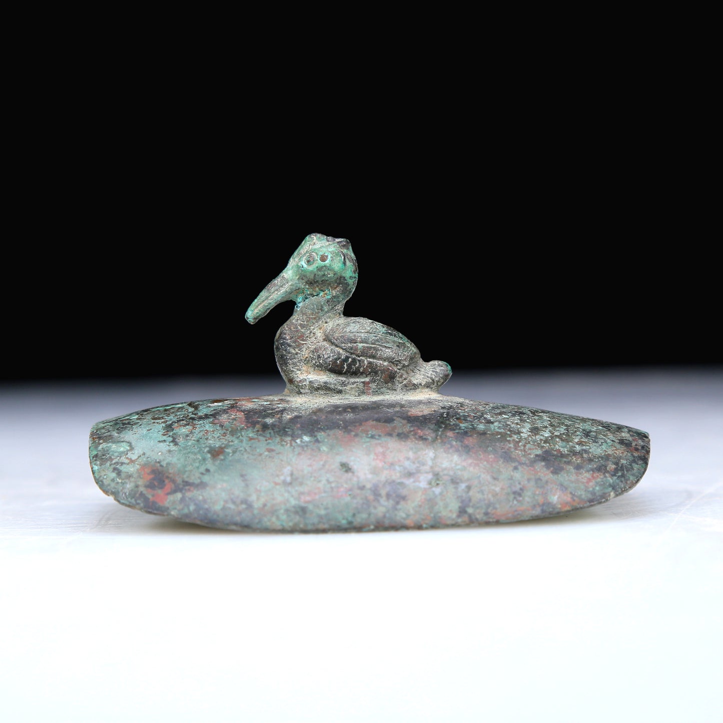 An Archaic Bronze Duck-Form Pot With Inscriptions And An Overhead Handle