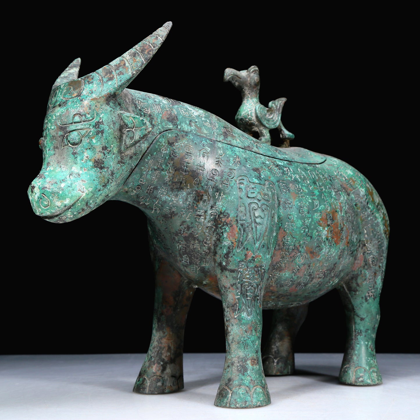 An Archaic Bronze Buffalo-Form Jar With Inscriptions
