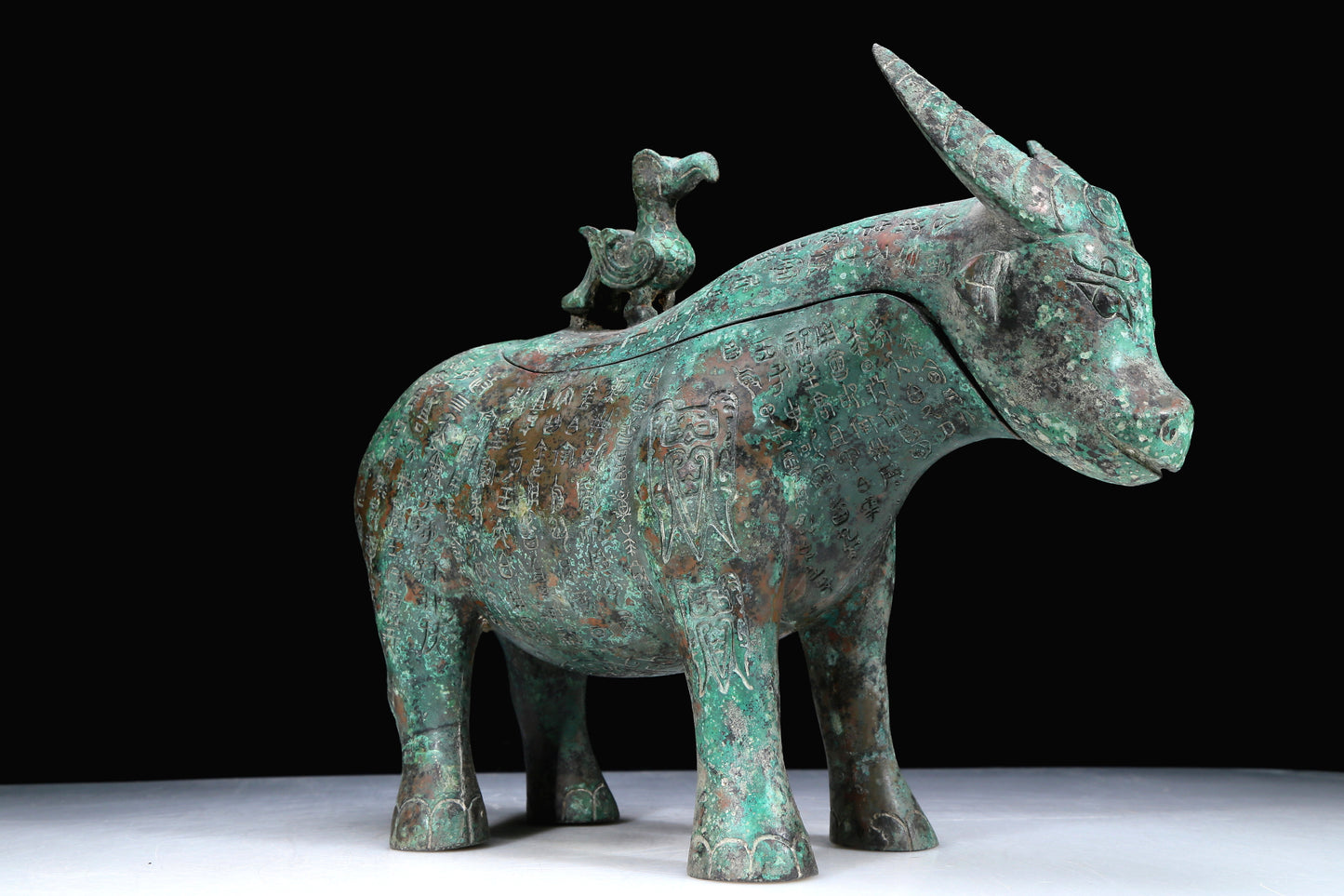 An Archaic Bronze Buffalo-Form Jar With Inscriptions