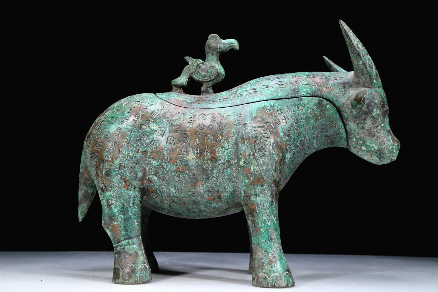 An Archaic Bronze Buffalo-Form Jar With Inscriptions