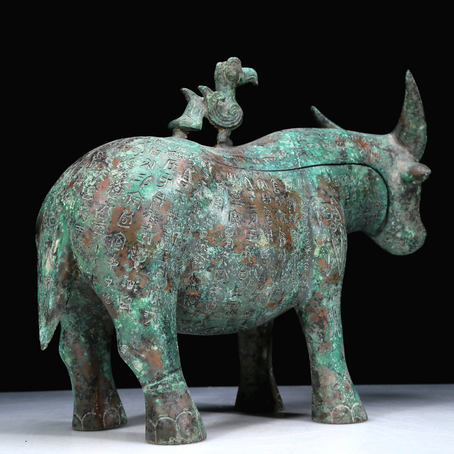 An Archaic Bronze Buffalo-Form Jar With Inscriptions