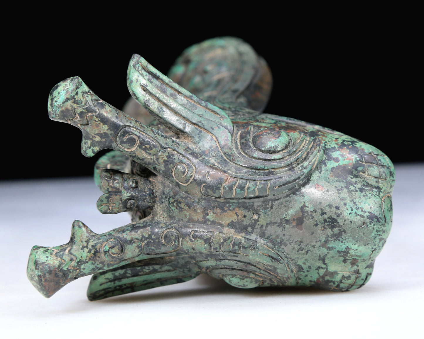 An Archaic Bronze 'Animal Mask' Ewer And Cover With Inscriptions