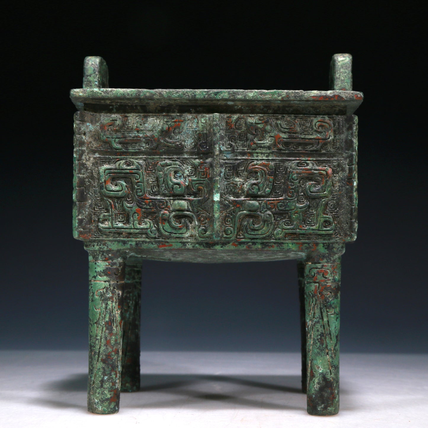 A Wonderful Bronze 'Animal Mask' Ritual Food Vessel, Ding, With Inscriptions