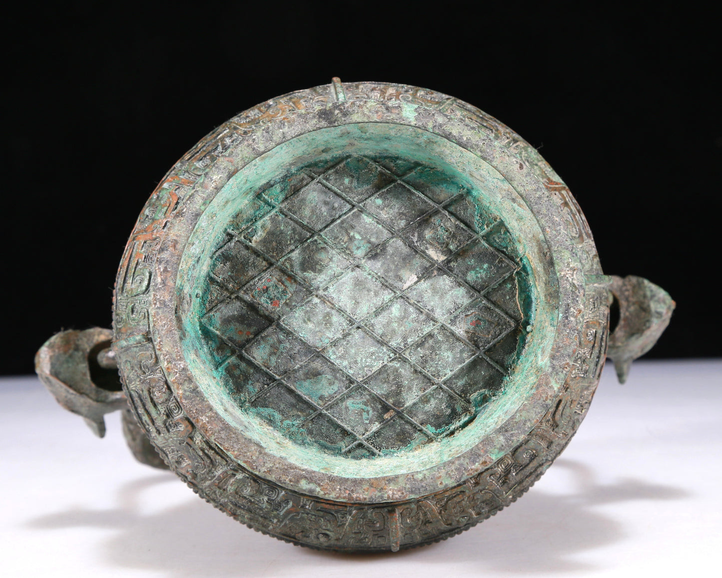 A Wonderful Bronze 'Mythical Bird' Beast-Handled Pot With Inscriptions And An Overhead Handle