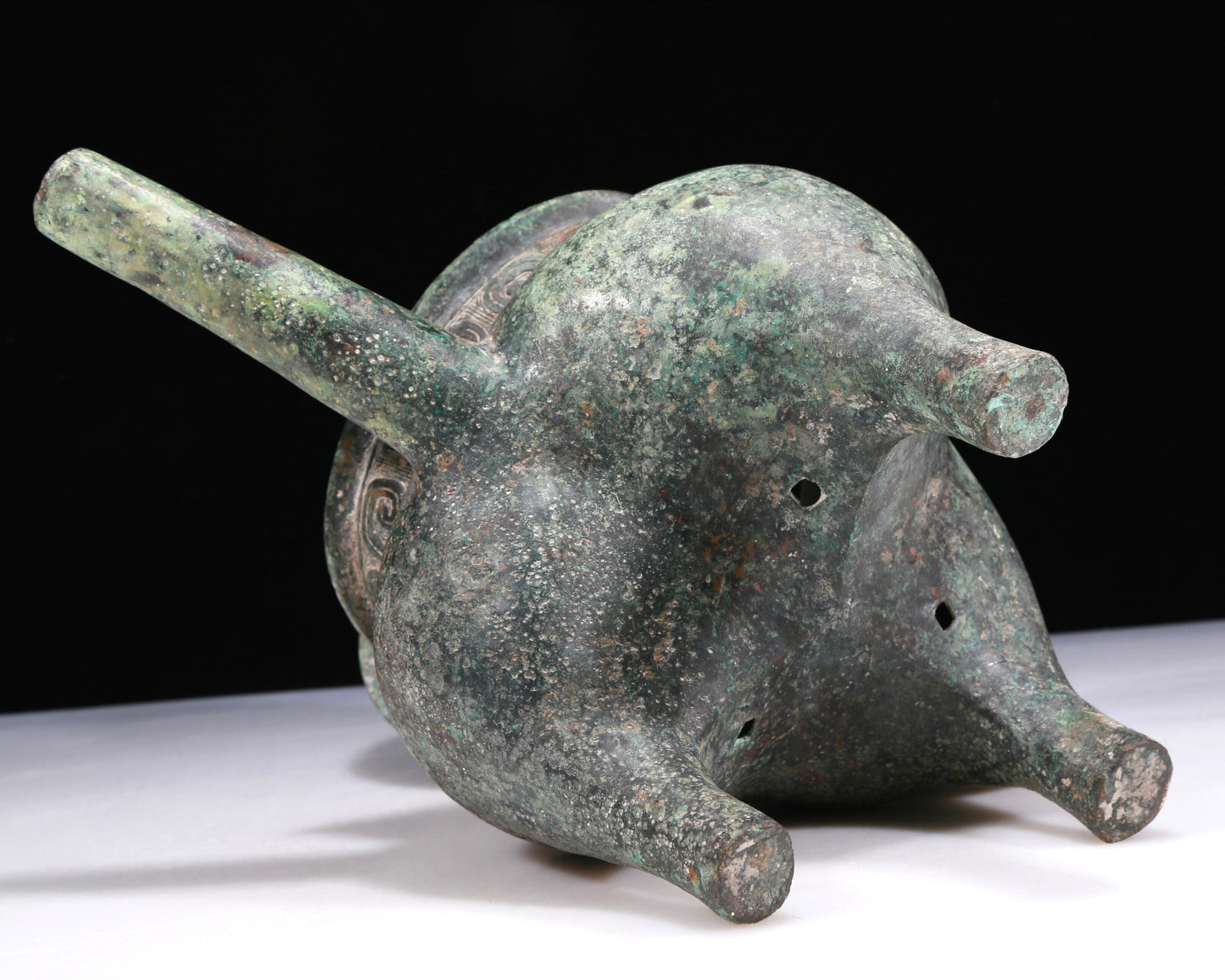 A Wonderful Bronze 'Auspicious Beast' Tripod Ewer