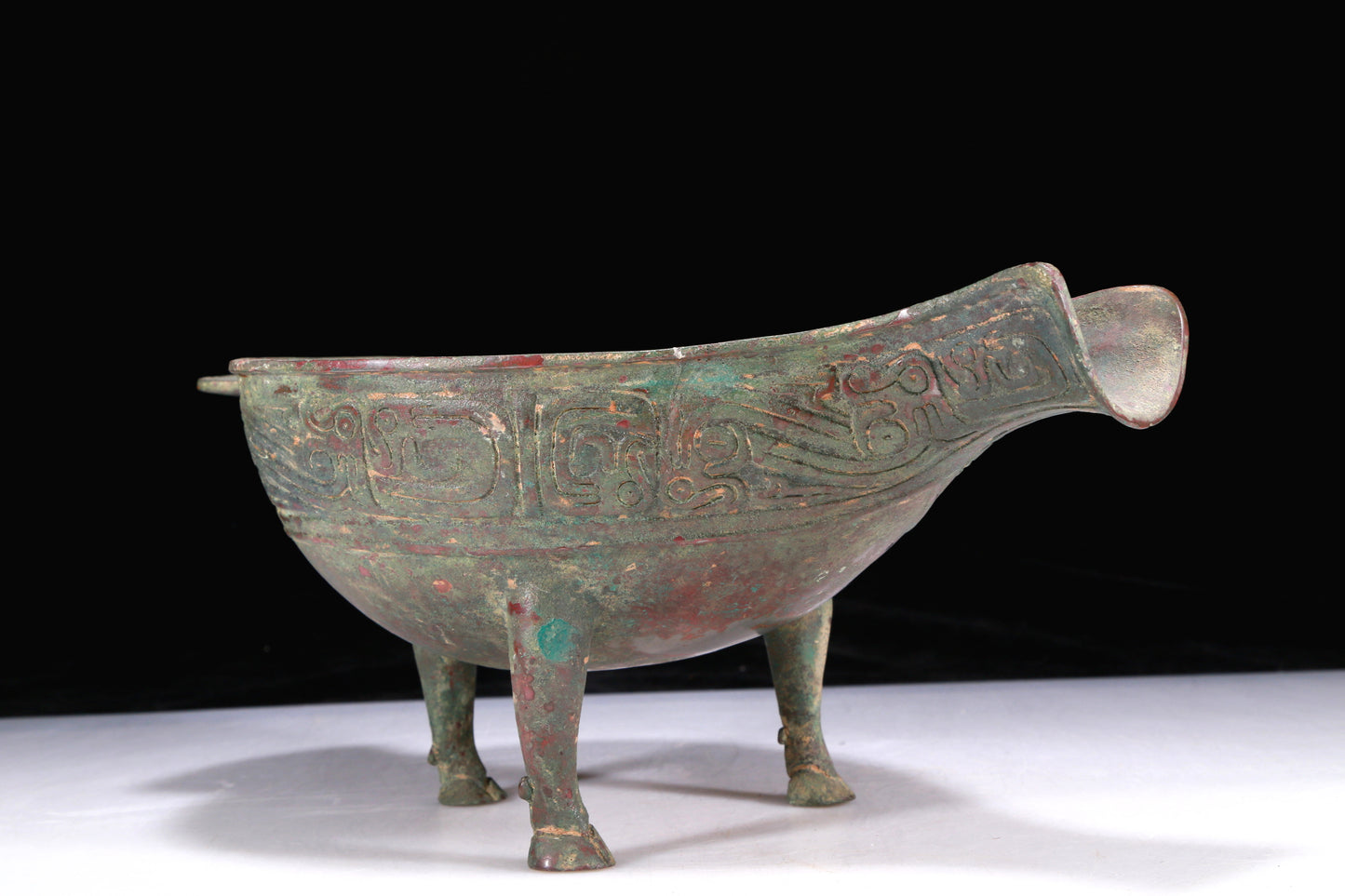 An Excellent Bronze 'Auspicious Beast' Tripod Ewer