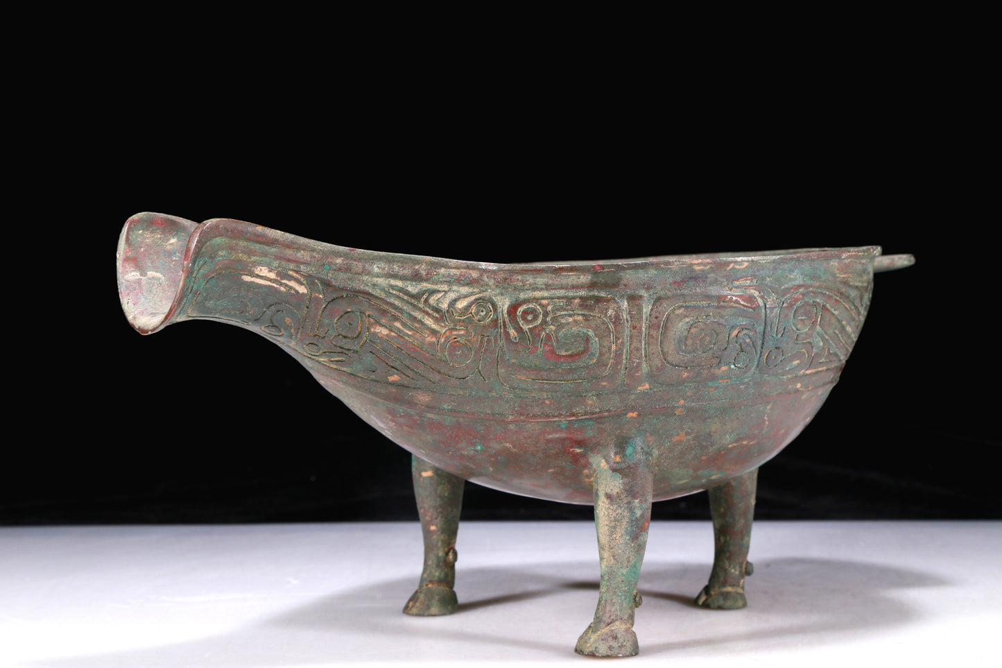 An Excellent Bronze 'Auspicious Beast' Tripod Ewer
