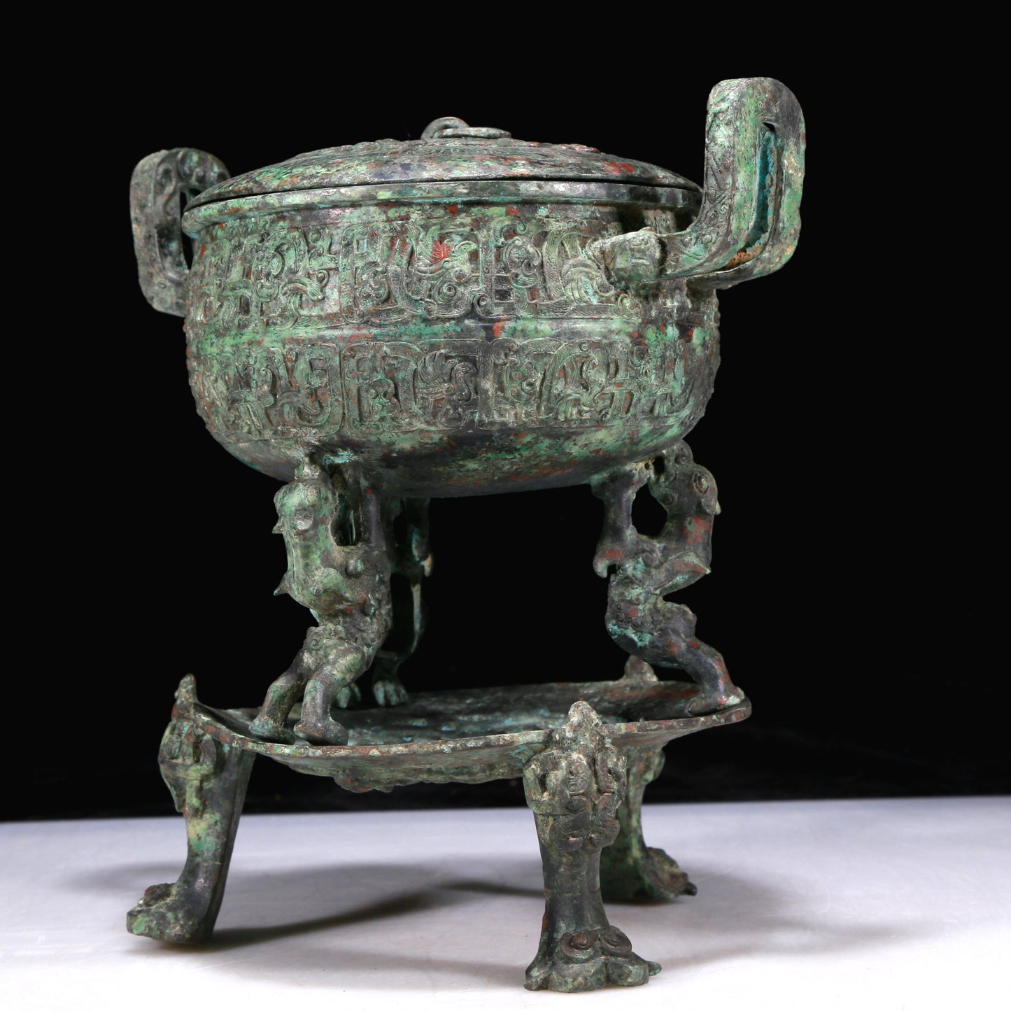 An Excellent Bronze 'Auspicious Beast' Tripod Censer And Cover