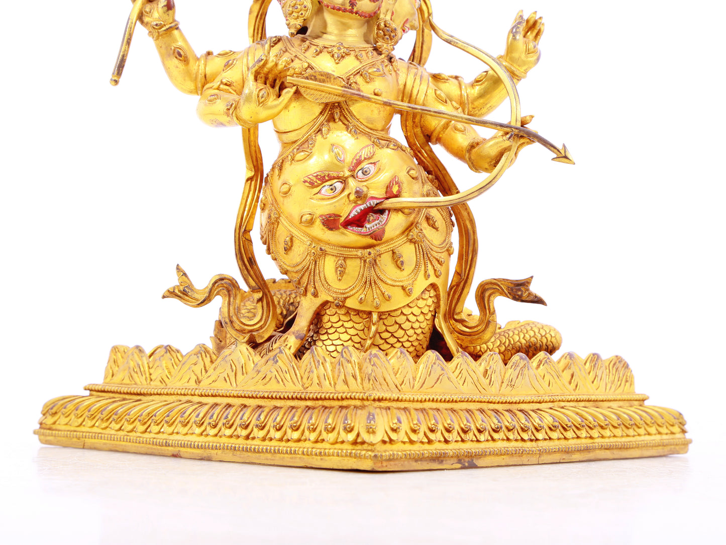 A solemn gilt bronze statue of the patron saint