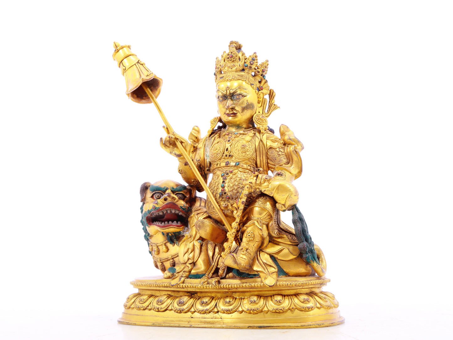 A solemn gilt bronze statue of the Heavenly King inlaid with precious stones