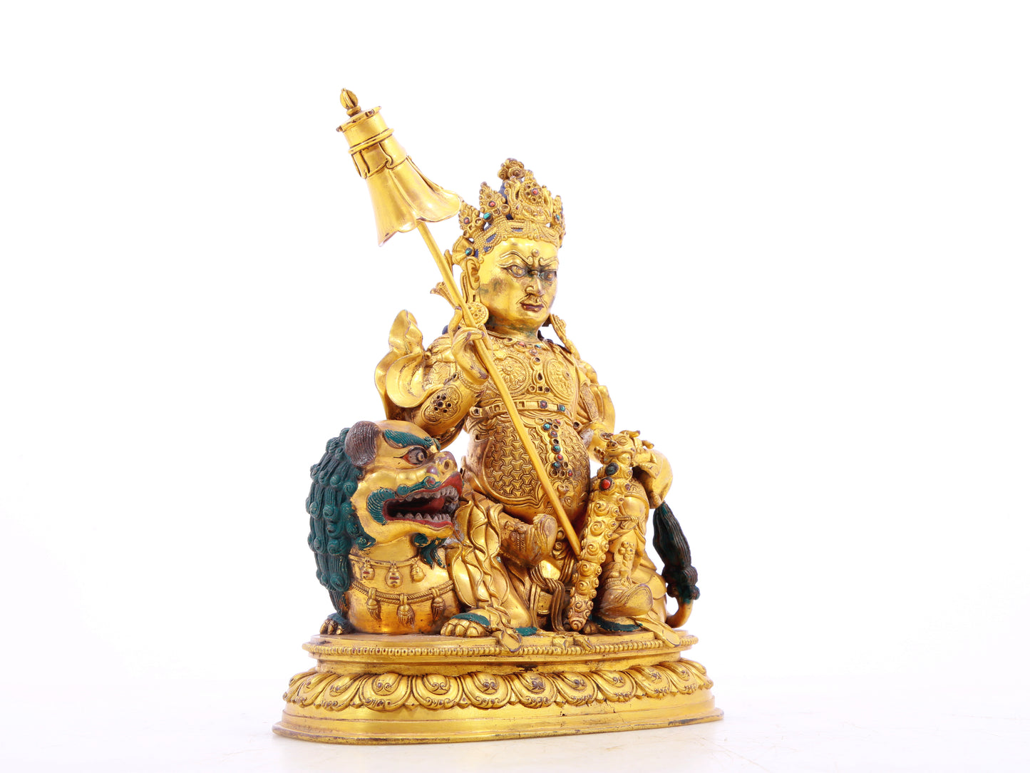 A solemn gilt bronze statue of the Heavenly King inlaid with precious stones