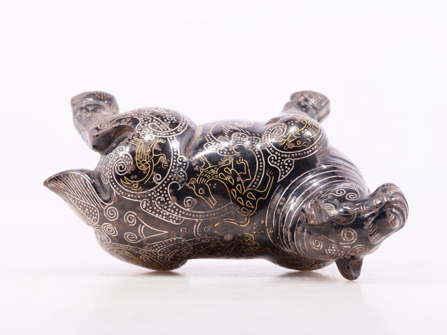 An exquisite bronze inlaid gold and silver auspicious animal ornament