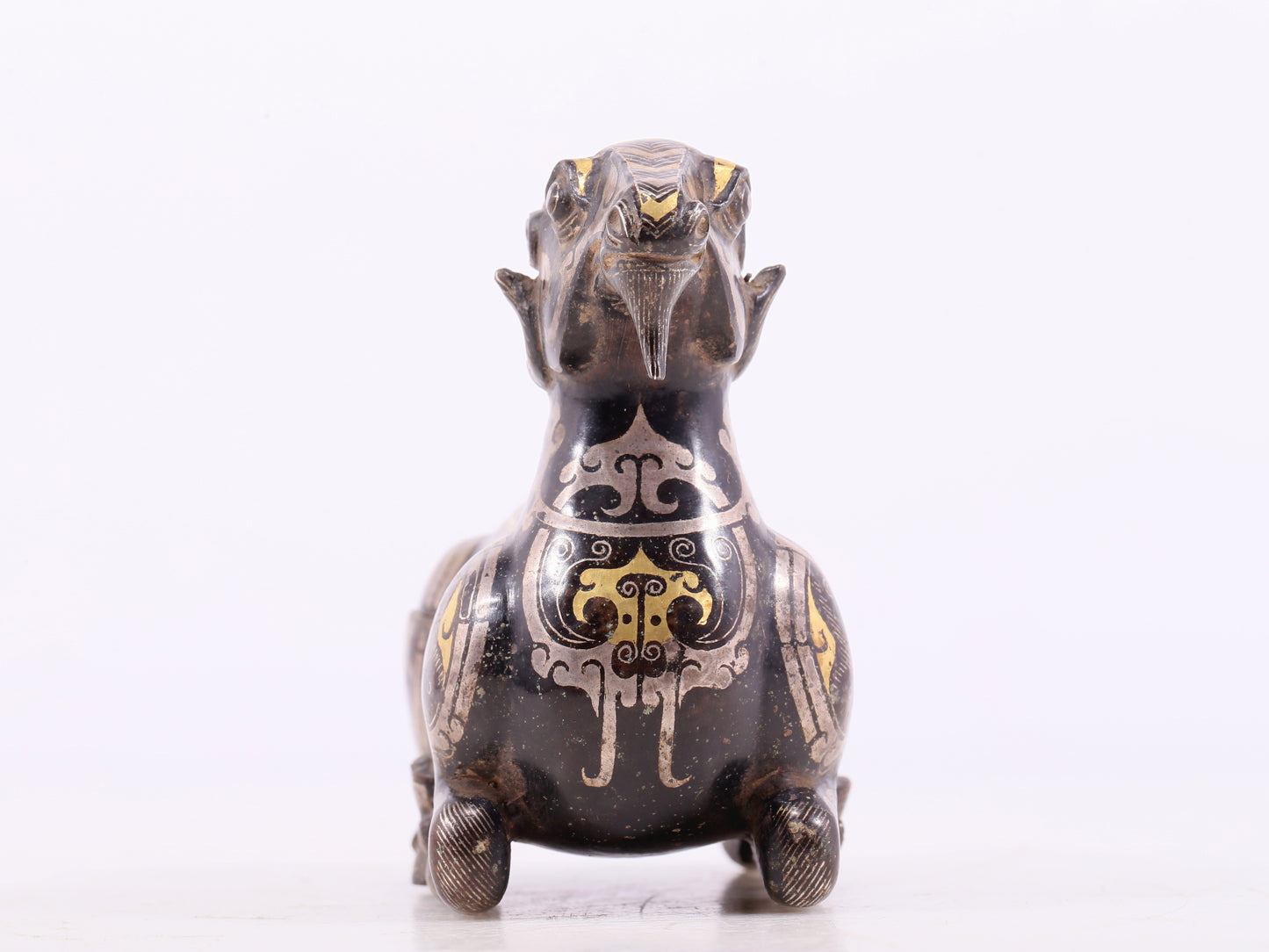 An Excellent Bronze Gold& Silver-Mounted Ram-Form Candlestick