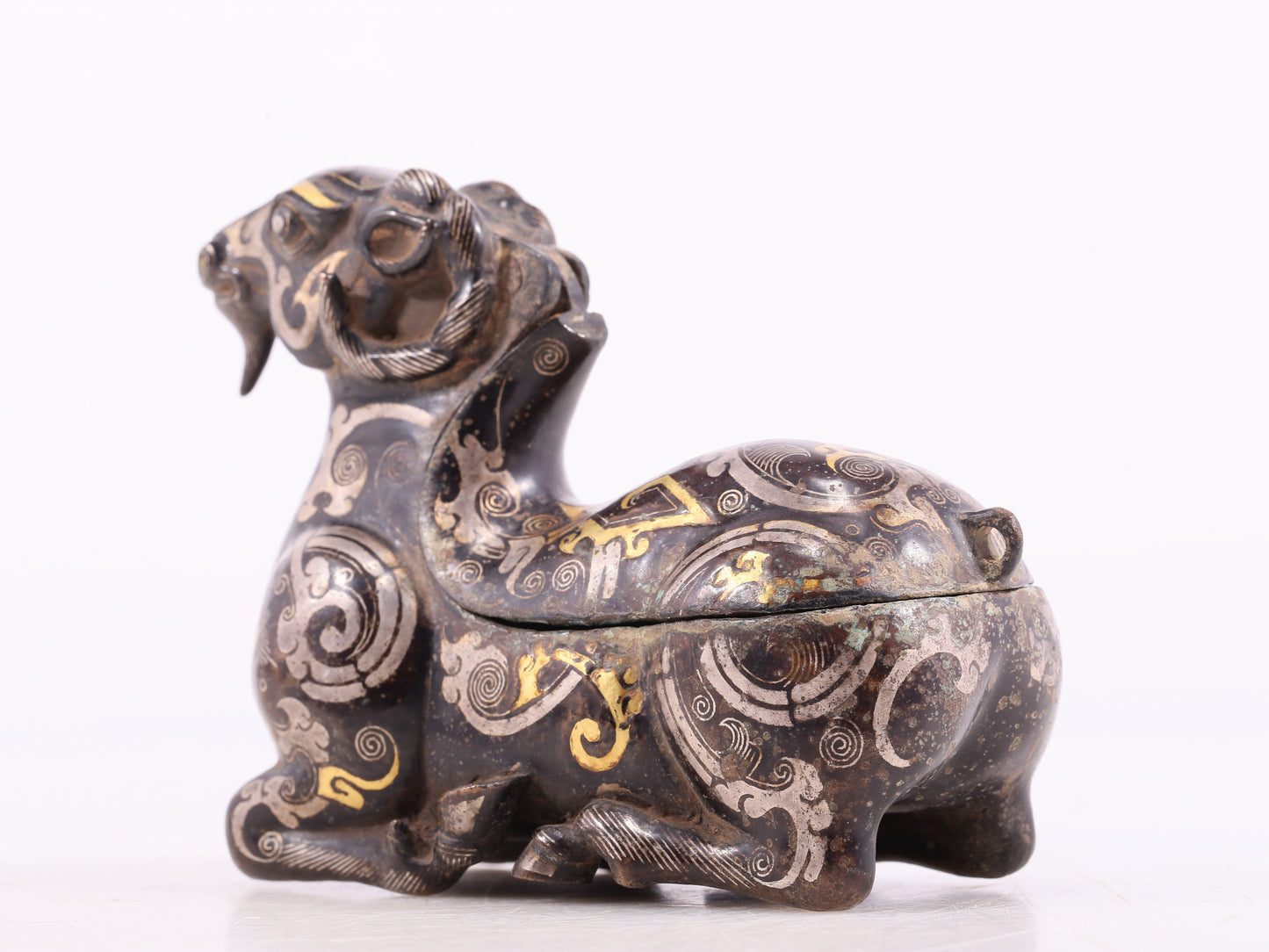 An Excellent Bronze Gold& Silver-Mounted Ram-Form Candlestick
