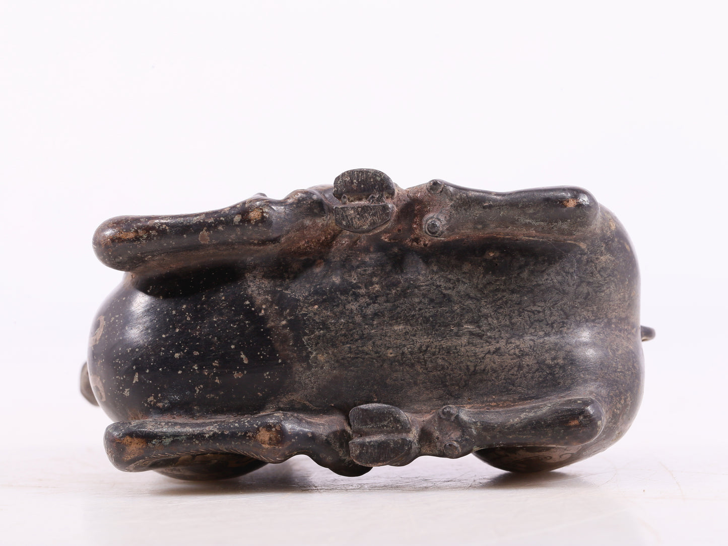 An Archaic Bronze Gold& Silver-Mounted Ram-Form Candlestick