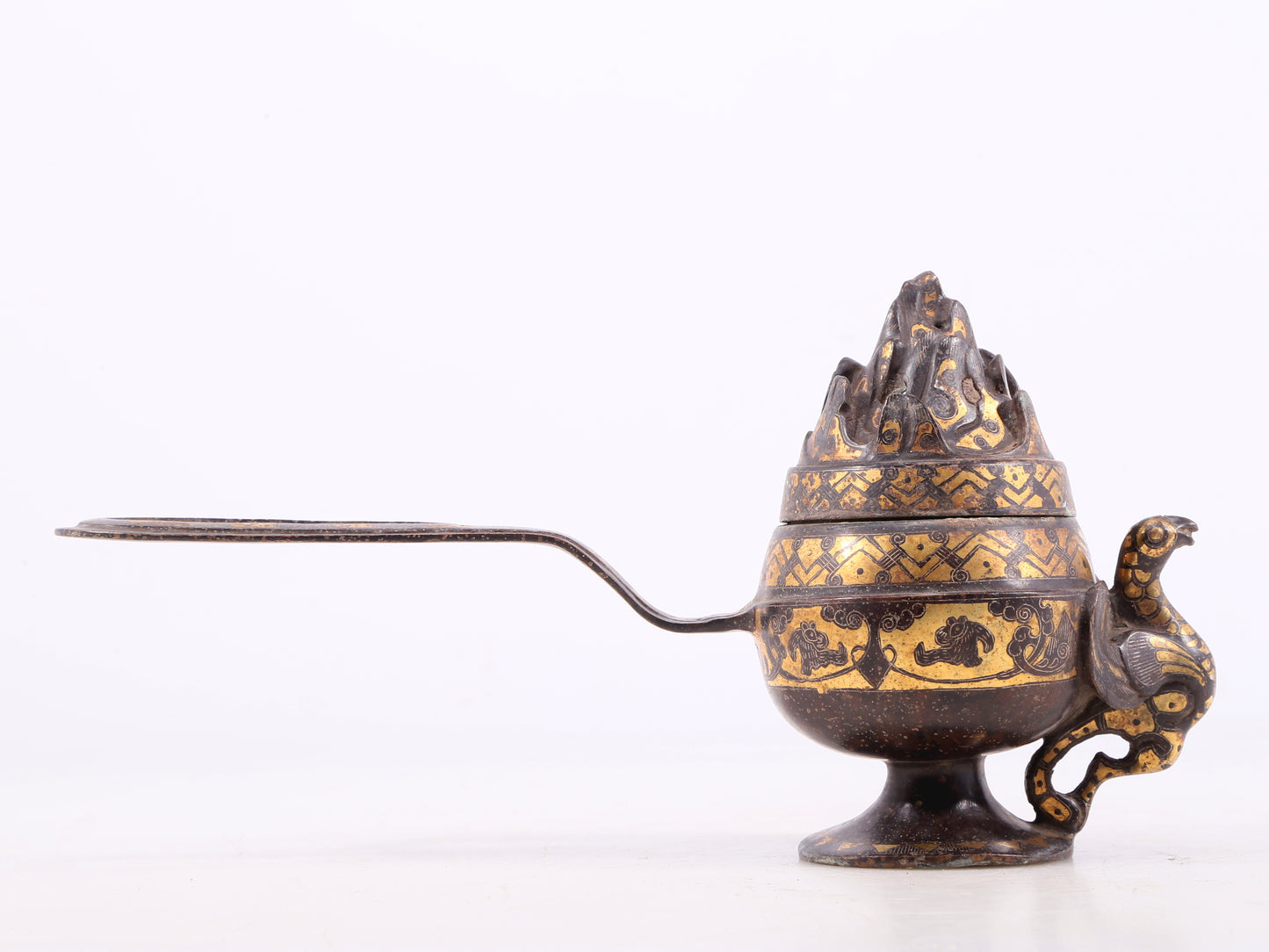 An exquisite bronze censer with gold and silver phoenix and floral patterns