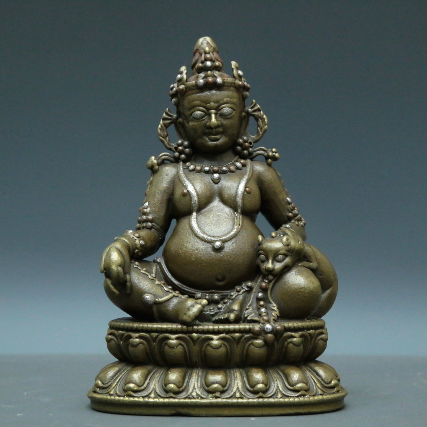 A Wonderful Alloy Copper Silver-Inlaid Figure Of Kubera And A Gilt-Bronze 'Weapons Of The Eight Immortals' Buddhist Shrine With Inscriptions
