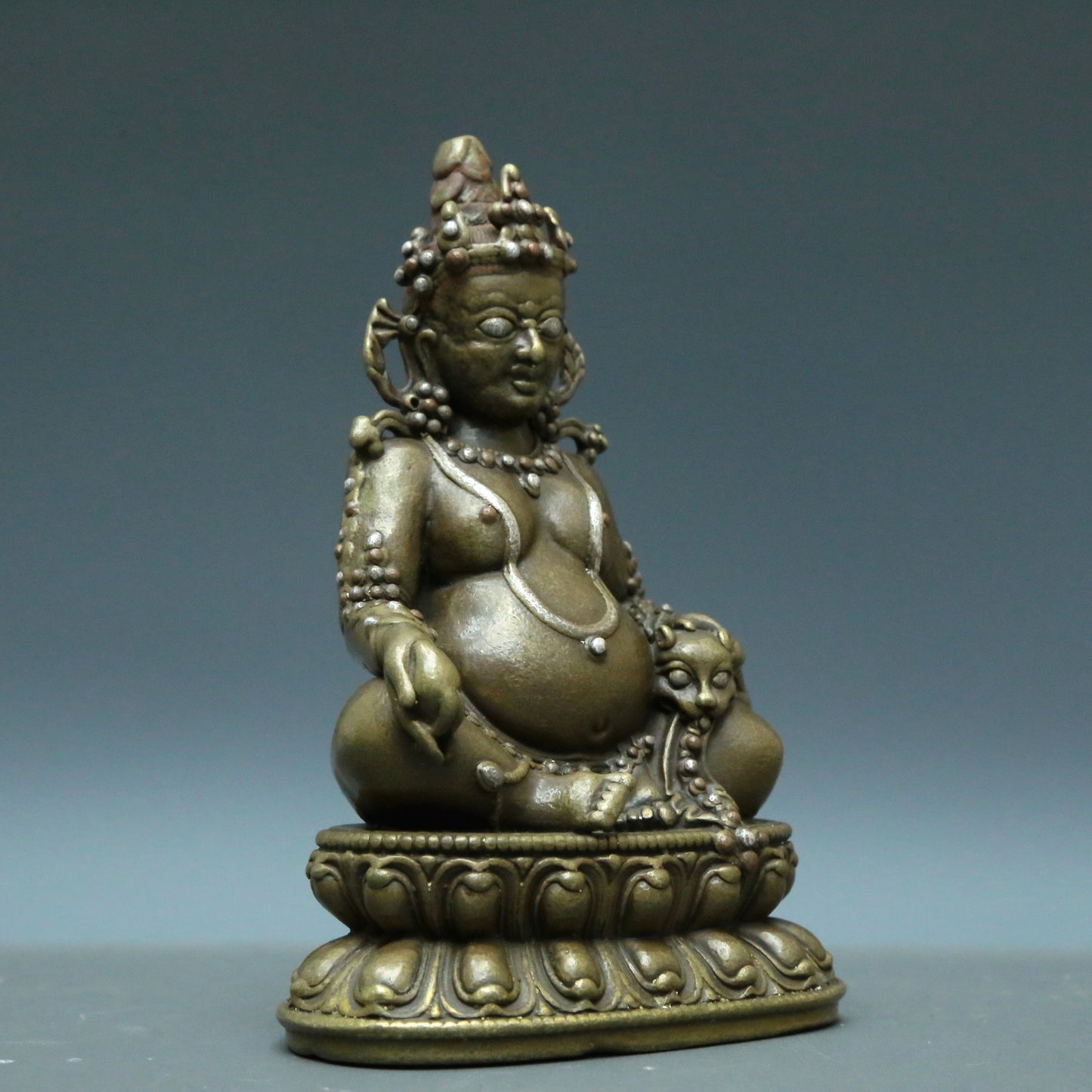 A Wonderful Alloy Copper Silver-Inlaid Figure Of Kubera And A Gilt-Bronze 'Weapons Of The Eight Immortals' Buddhist Shrine With Inscriptions