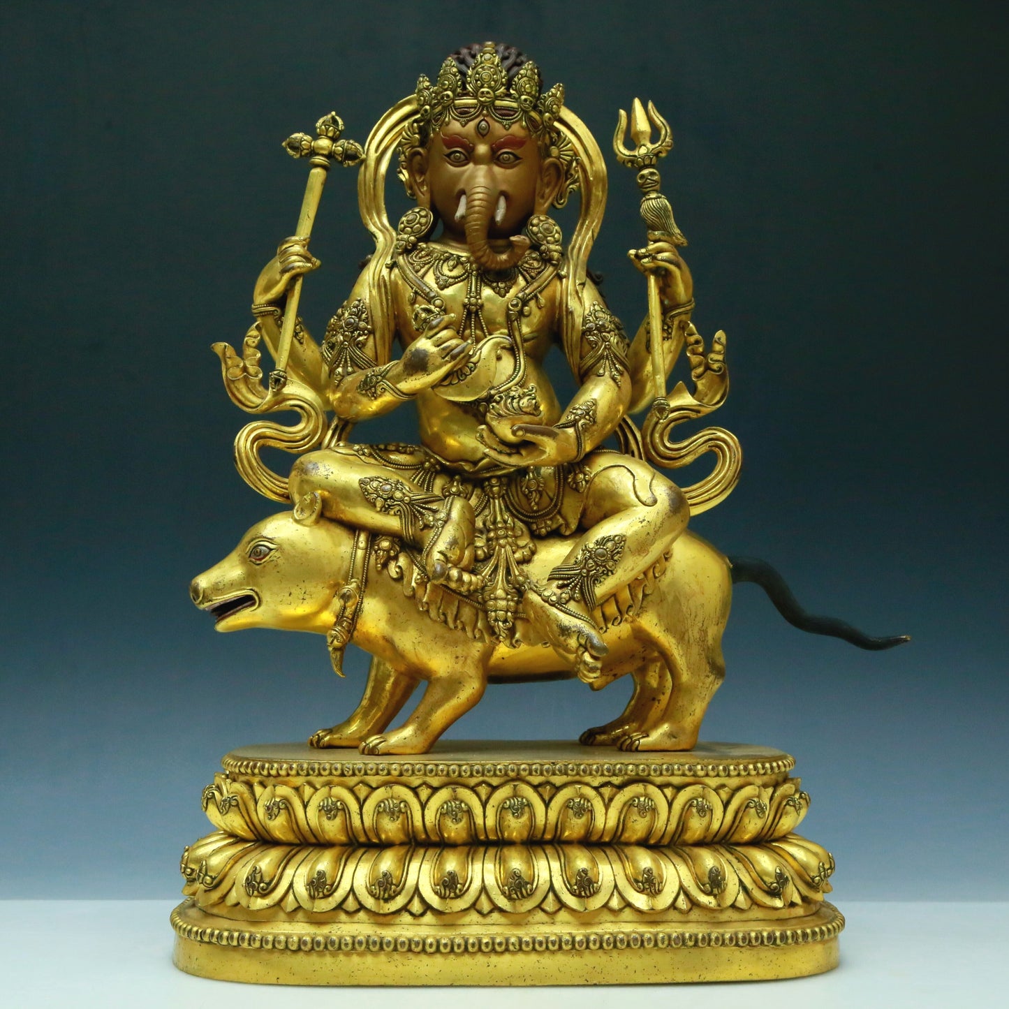 A Wonderful Gilt-Bronze Figure Of Kubera With An Elephant's Trunk