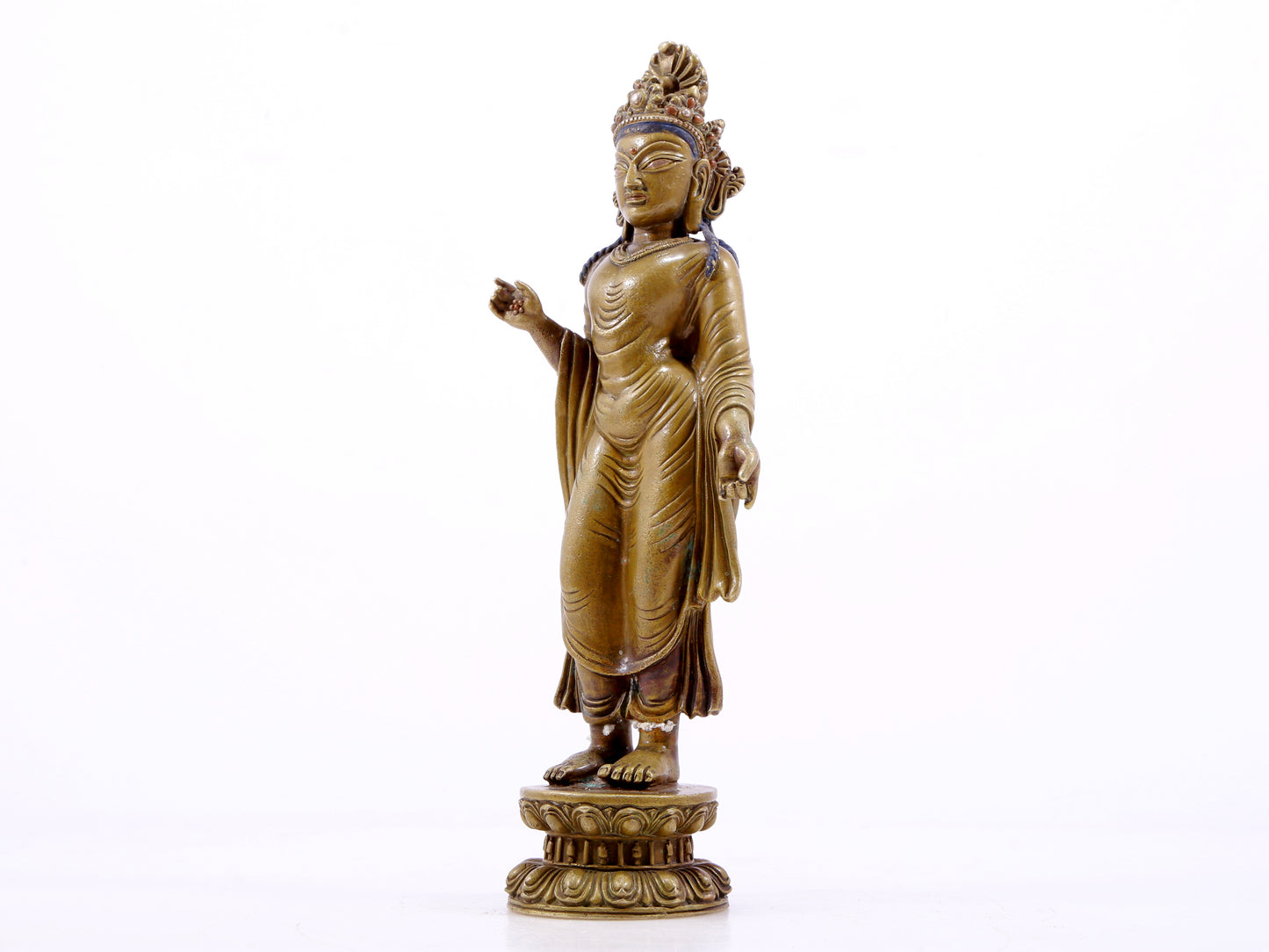 A solemn statue of Bodhisattva made of alloy copper and inlaid with silver