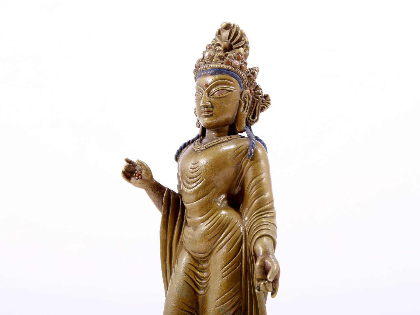A solemn statue of Bodhisattva made of alloy copper and inlaid with silver