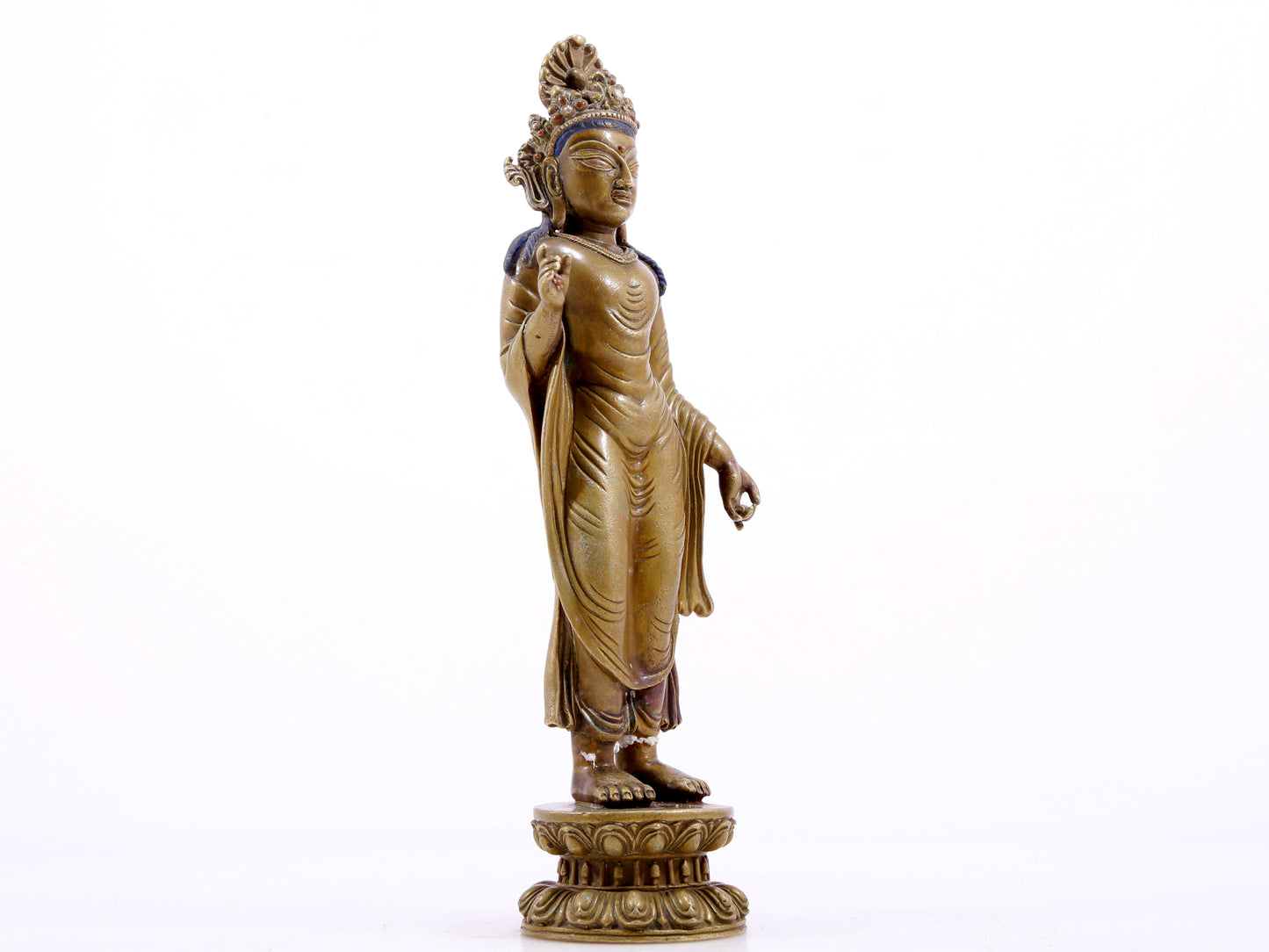 A solemn statue of Bodhisattva made of alloy copper and inlaid with silver