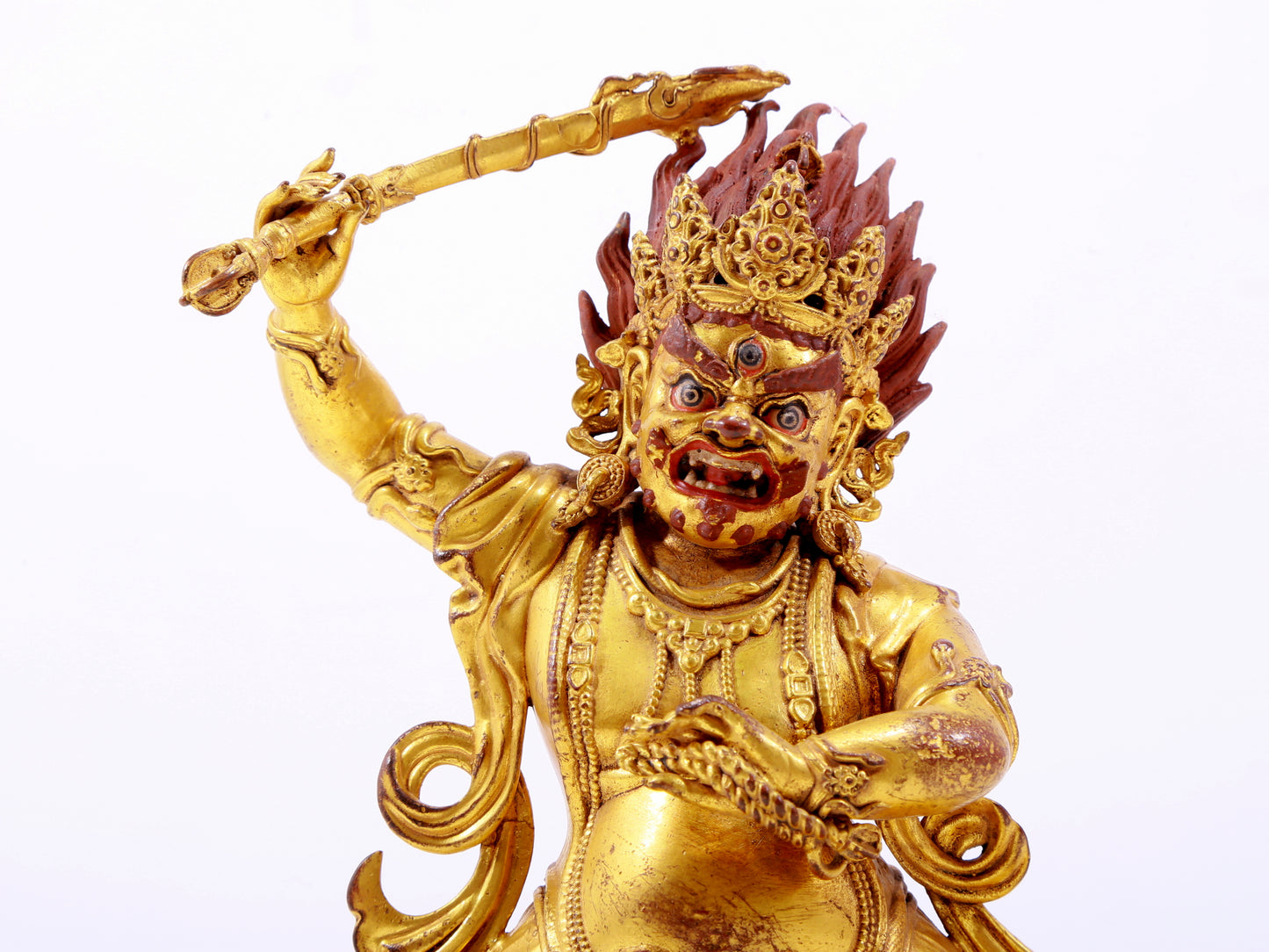 A solemn gilt bronze Vajra statue