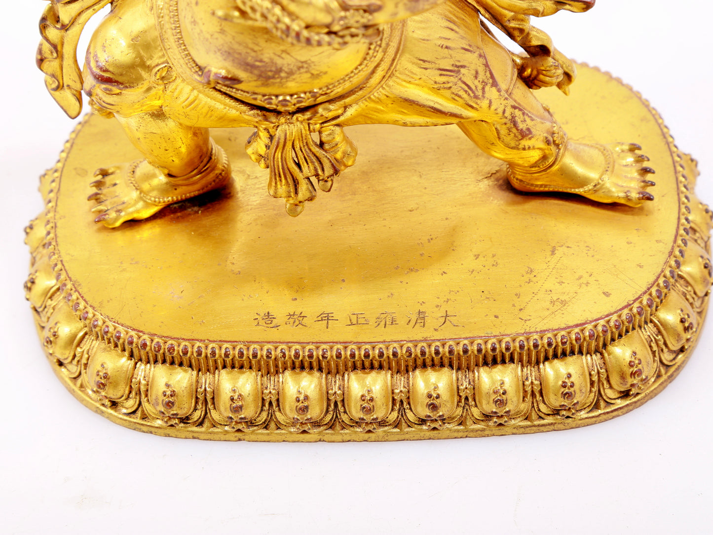 A solemn gilt bronze Vajra statue