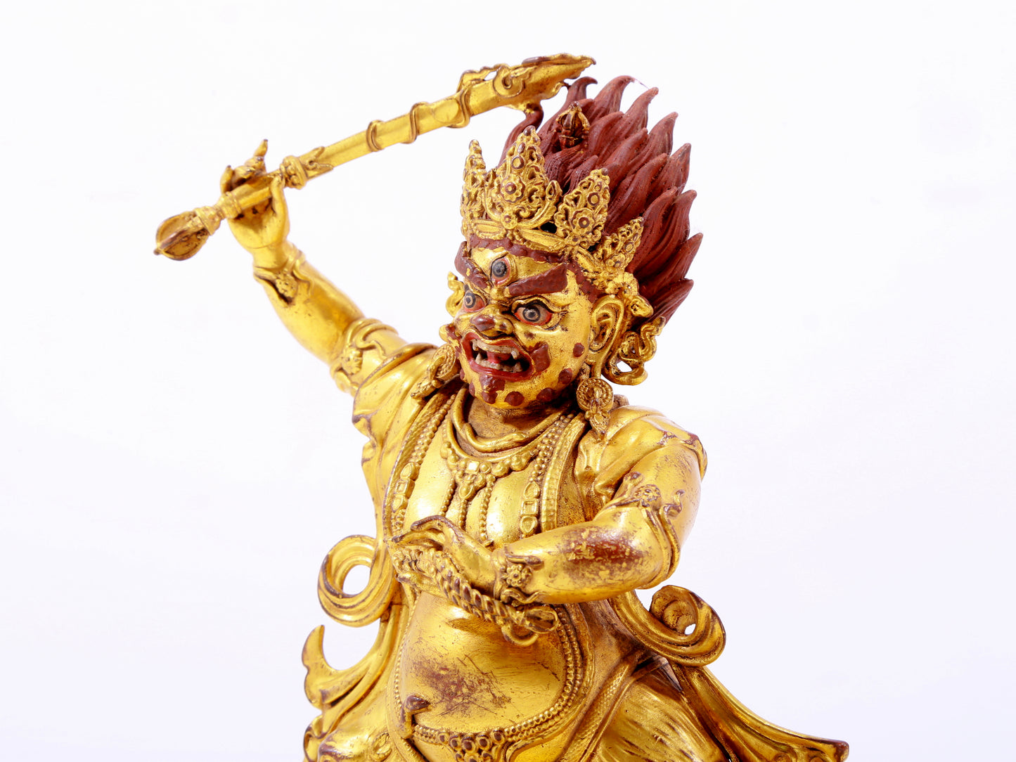 A solemn gilt bronze Vajra statue