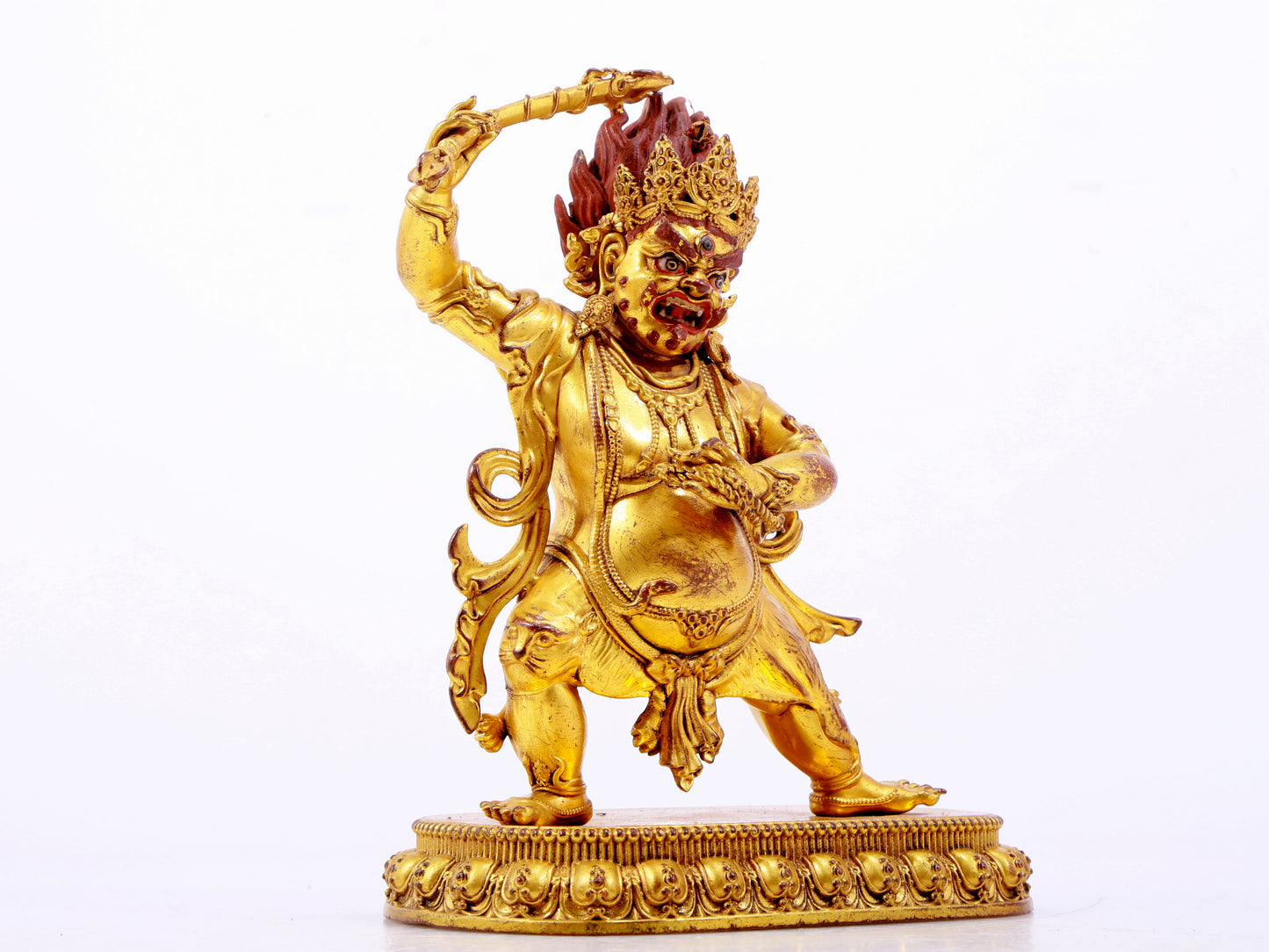 A solemn gilt bronze Vajra statue