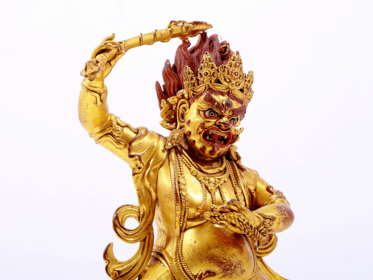 A solemn gilt bronze Vajra statue