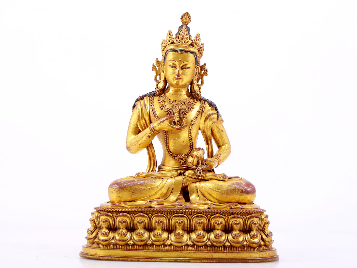 A solemn gilt bronze statue of Vajrasattva