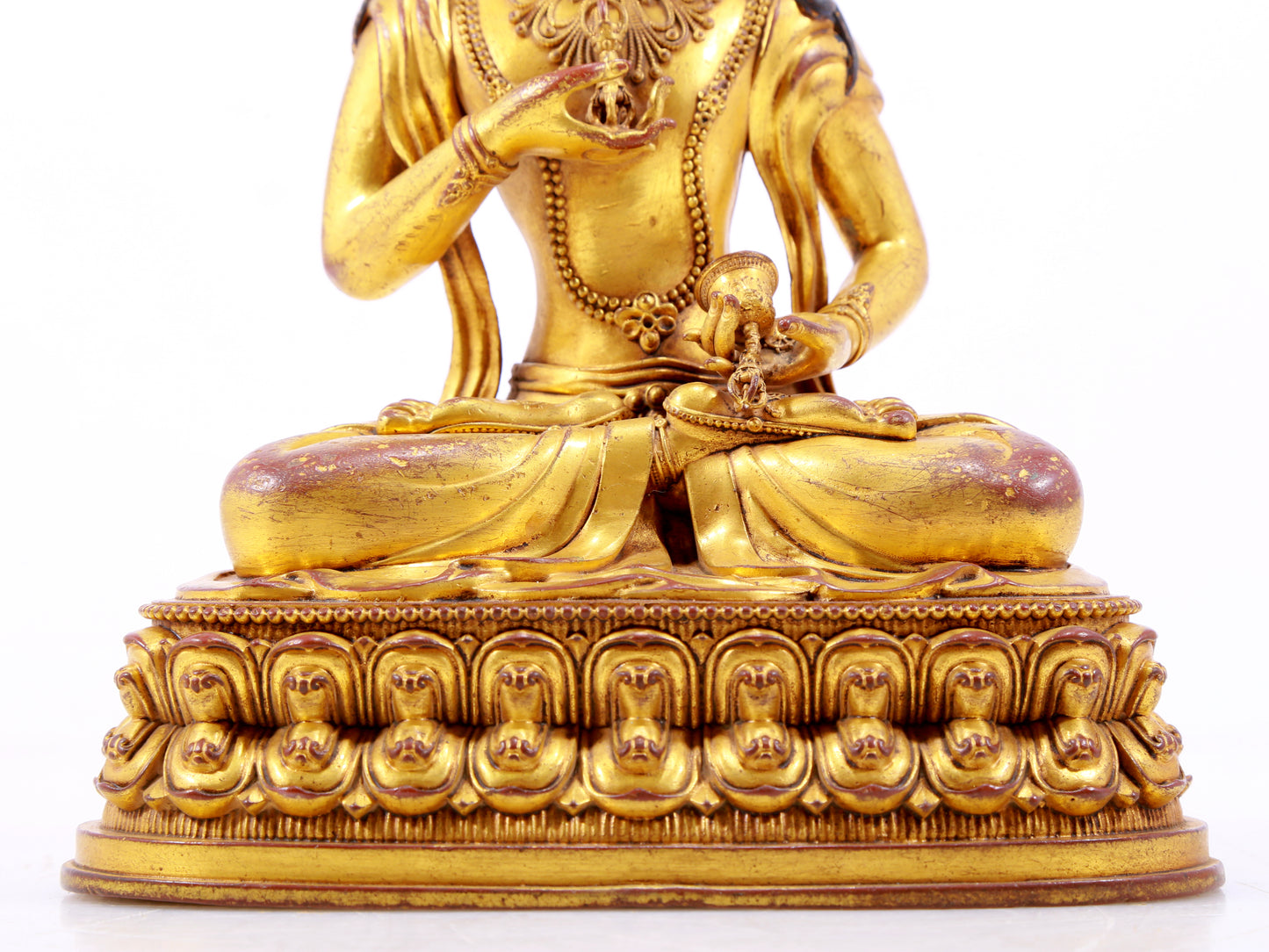 A solemn gilt bronze statue of Vajrasattva
