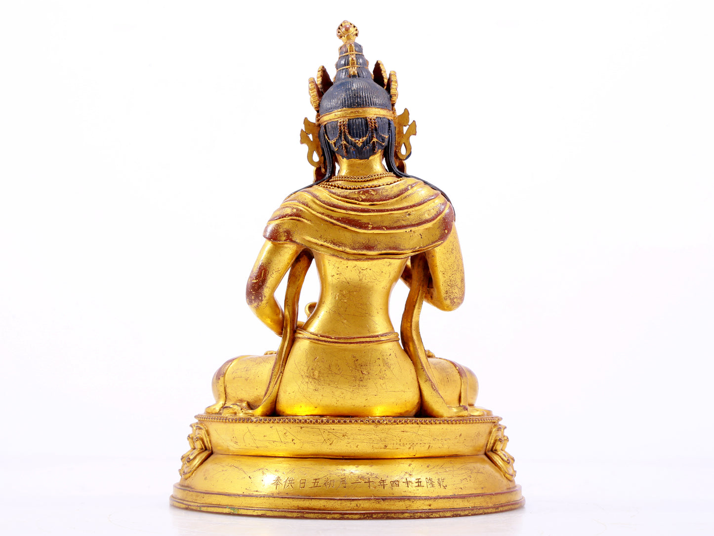 A solemn gilt bronze statue of Vajrasattva
